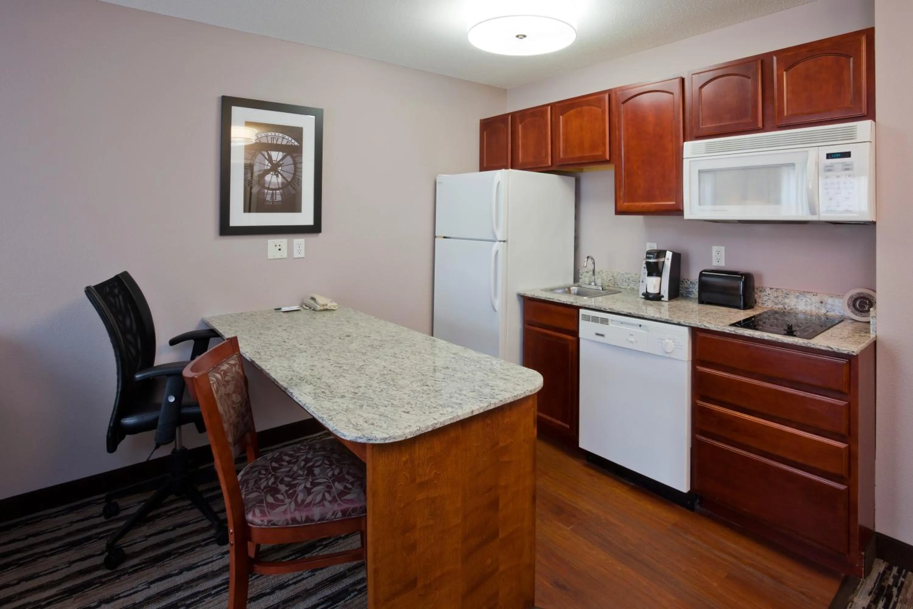 Kitchen or kitchenette in GrandStay Residential Suites Hotel
