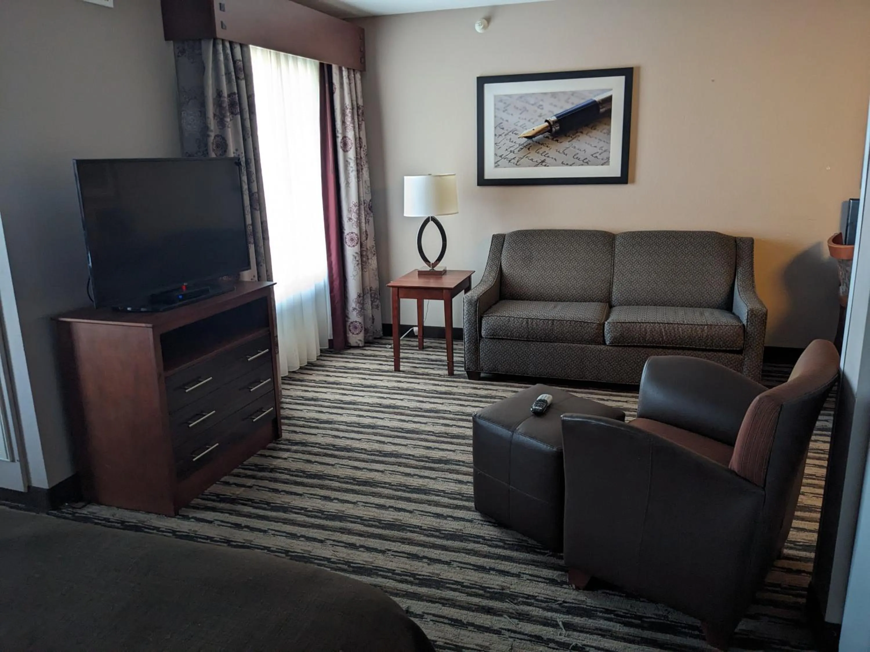 Seating area in GrandStay Residential Suites Hotel