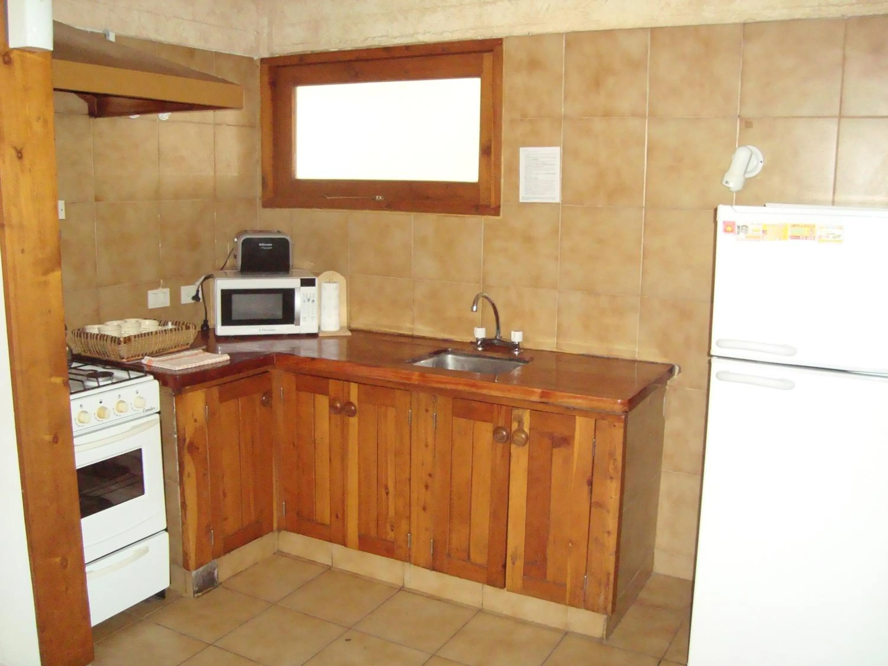 Kitchen or kitchenette in Cabañas Rucaleufu