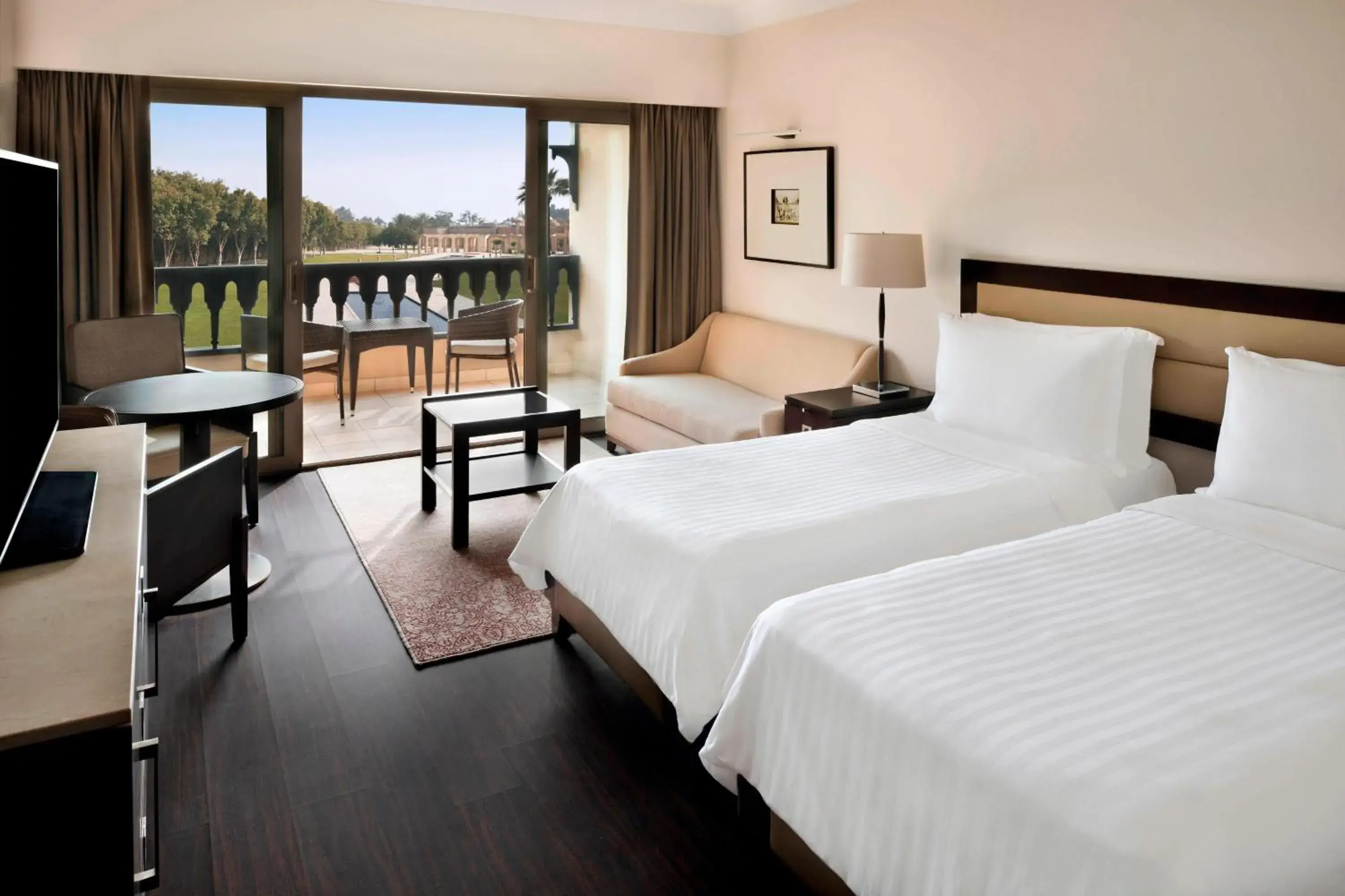 Deluxe Garden View Room, Guest room, 2 Twin,Garden view, Balcony - single occupancy in Marriott Mena House, Cairo Deluxe Garden View Room, Guest room, 2 Twin,Garden view, Balcony - single occupancy in Marriott Mena House, Cairo