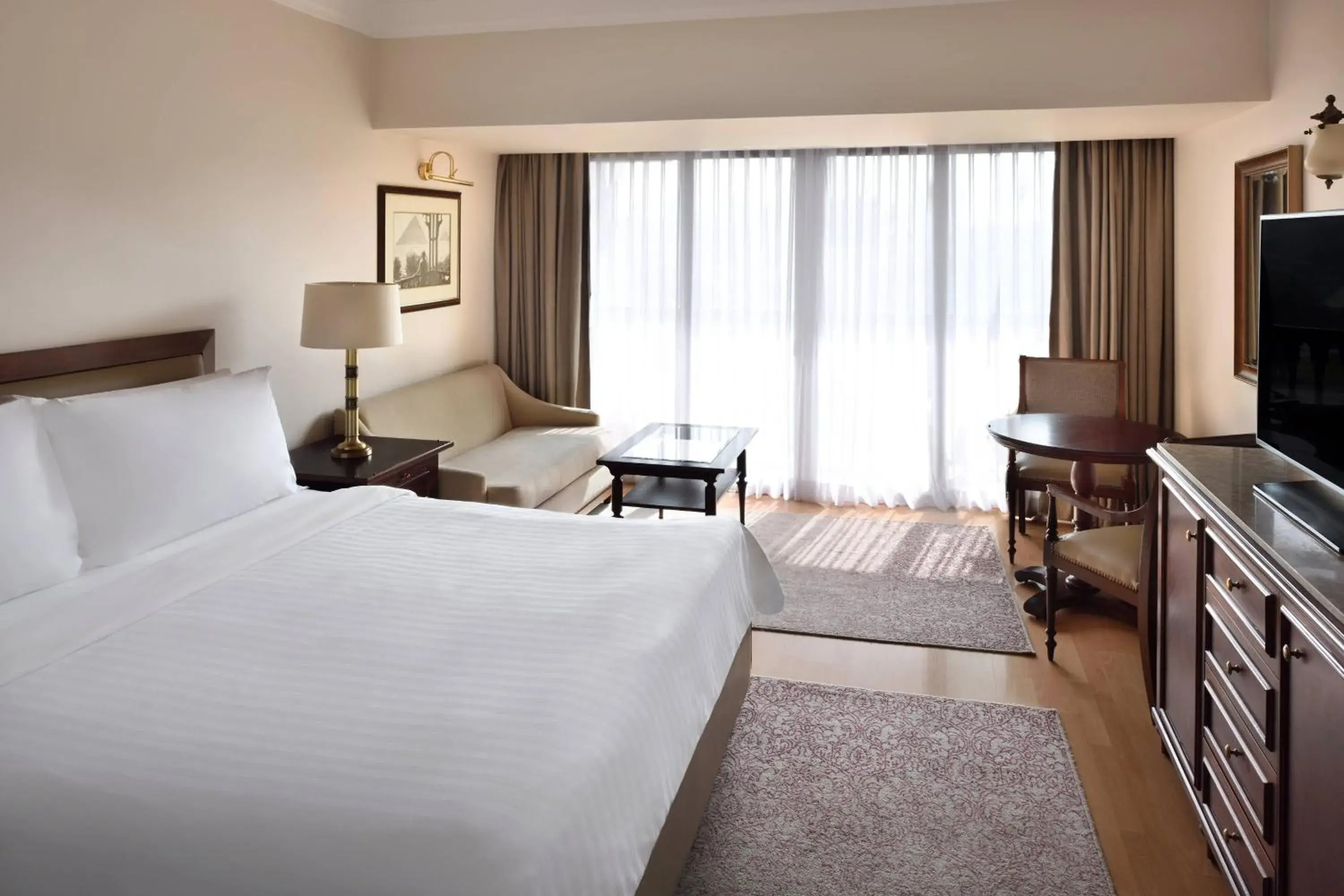 Executive Partial Pyramid View Room, Executive lounge access, Guest room, 1 King - single occupancy in Marriott Mena House, Cairo Executive Partial Pyramid View Room, Executive lounge access, Guest room, 1 King - single occupancy in Marriott Mena House, Cairo