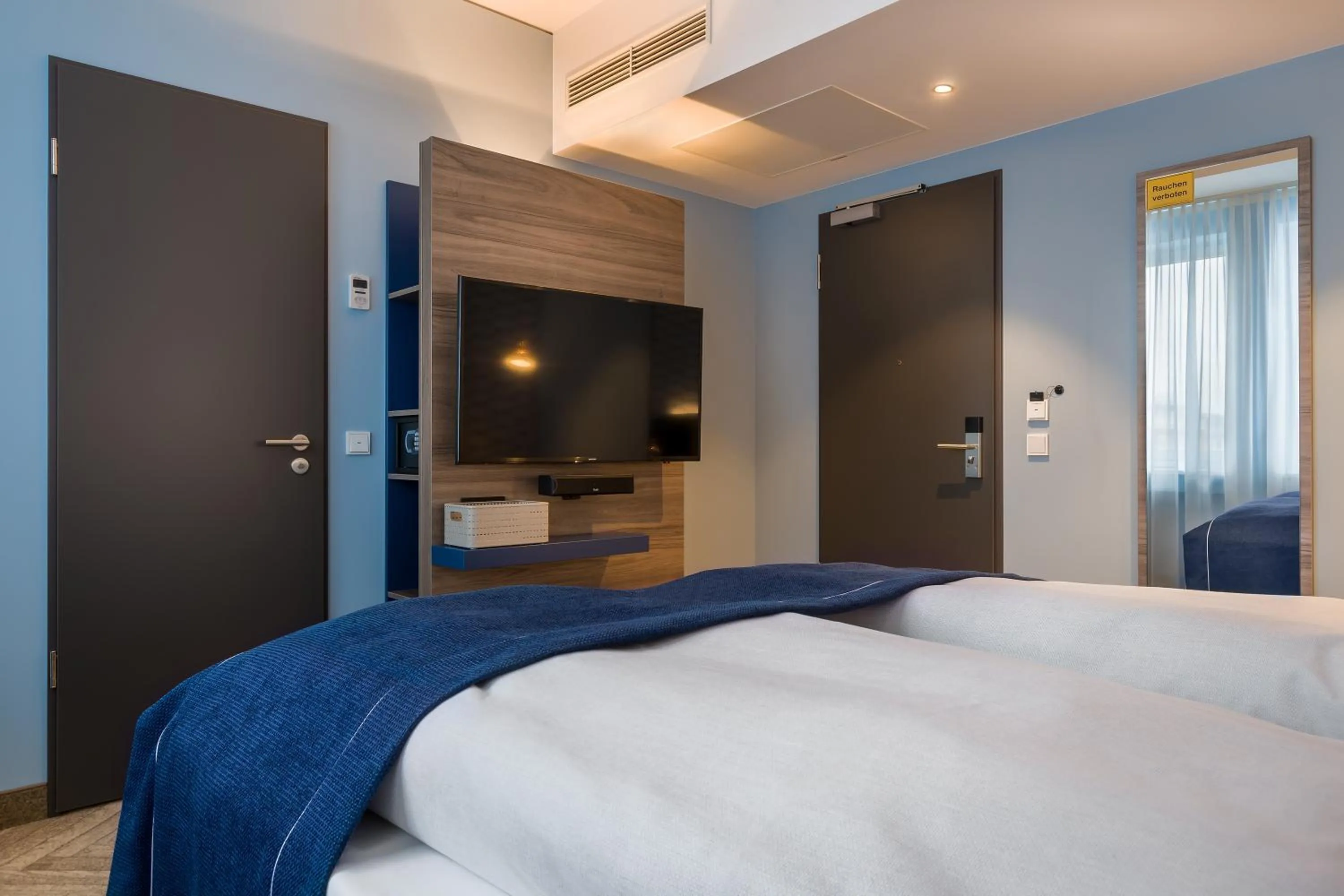 Bed in Holiday Inn - the niu, Welly Kiel by IHG