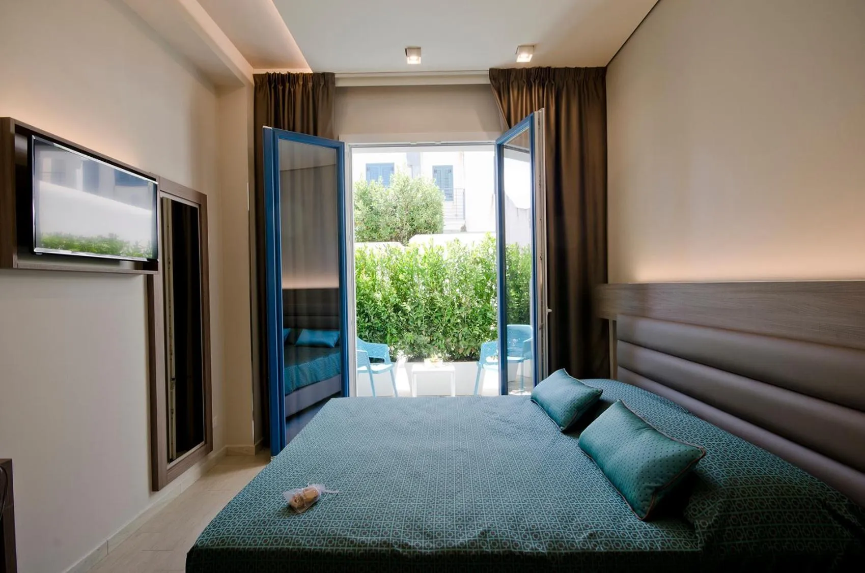 Bed in Hermes Hotel