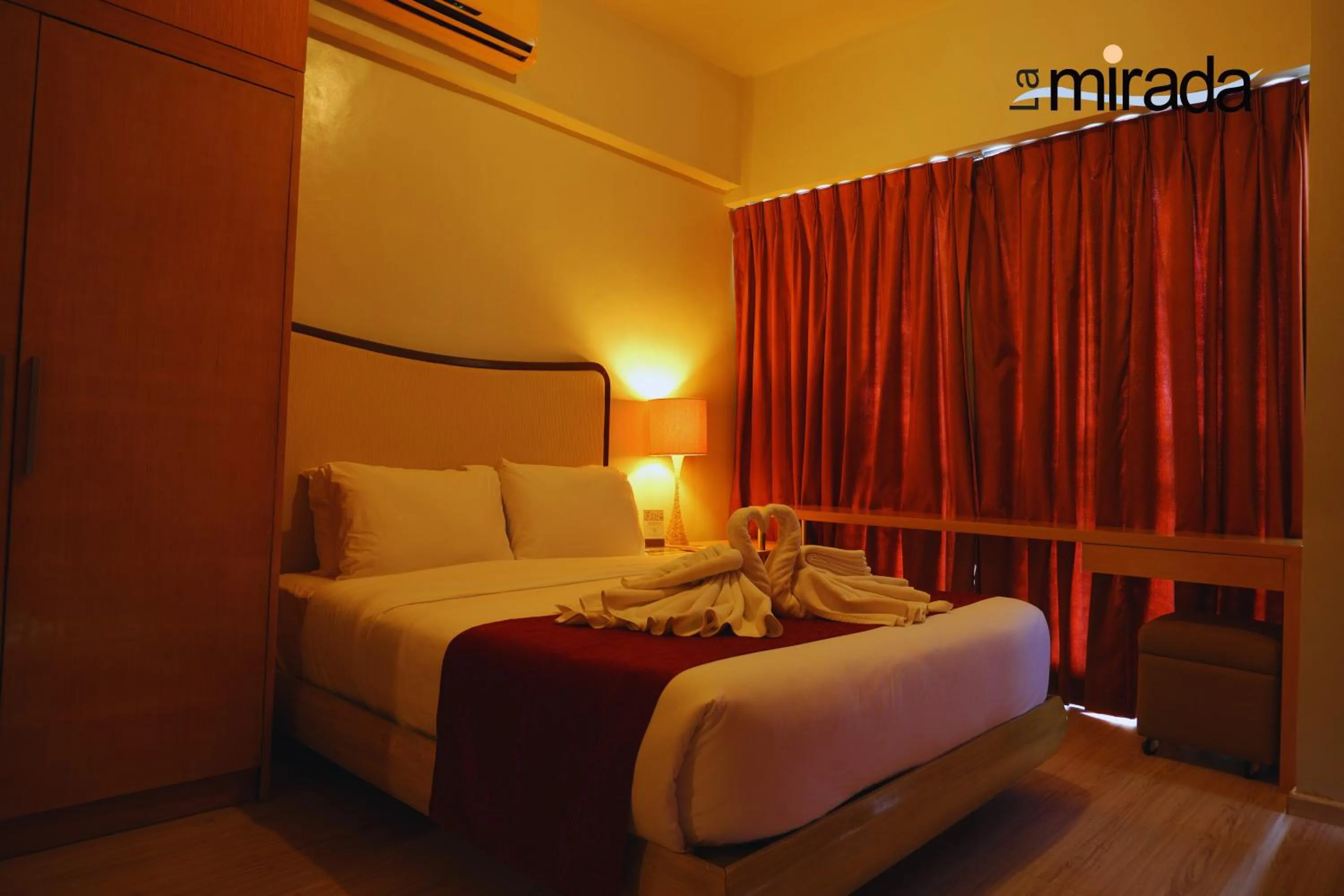 Bed in La Mirada Hotel