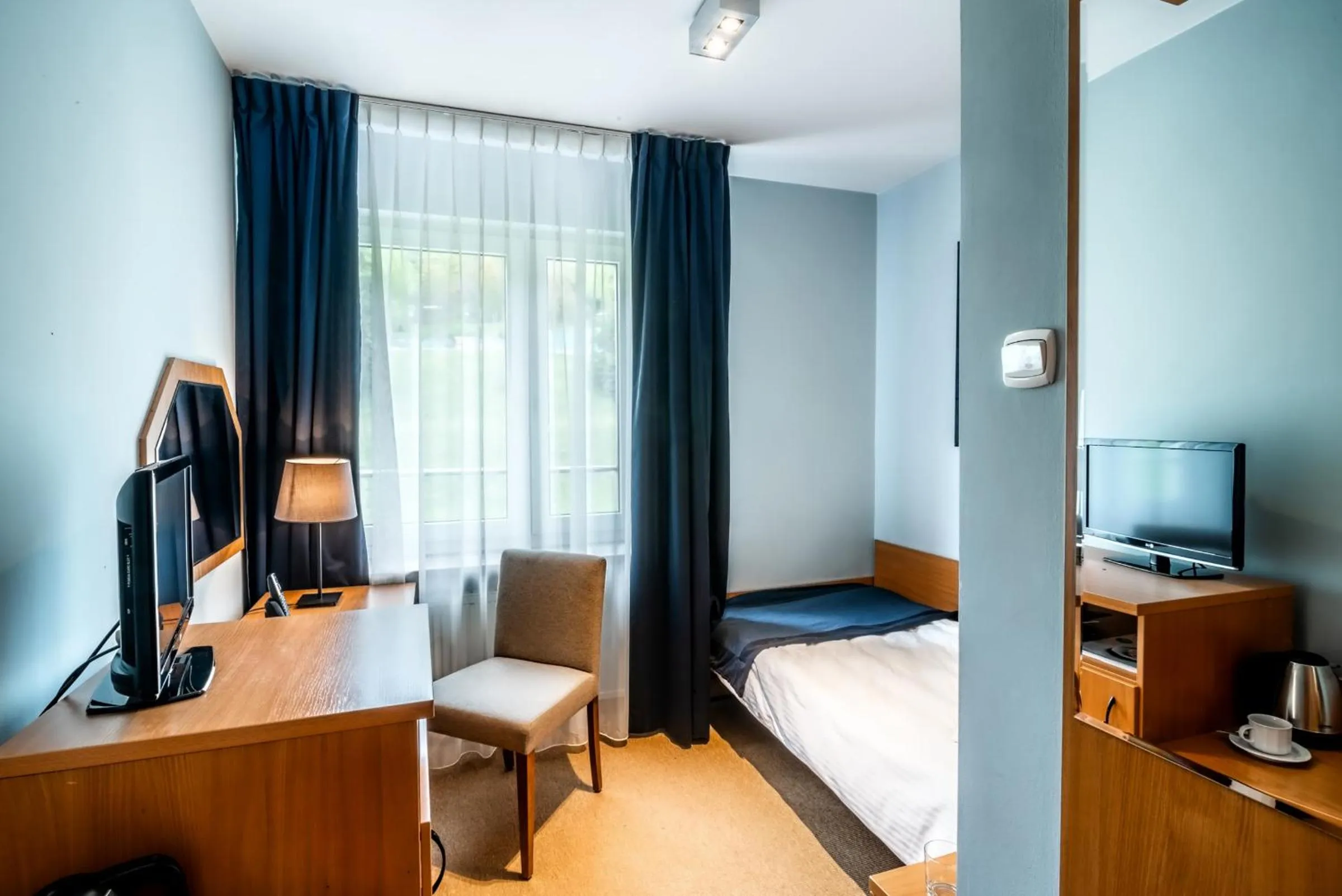 Living room, Bed in Hotel Nawigator Szczawnica