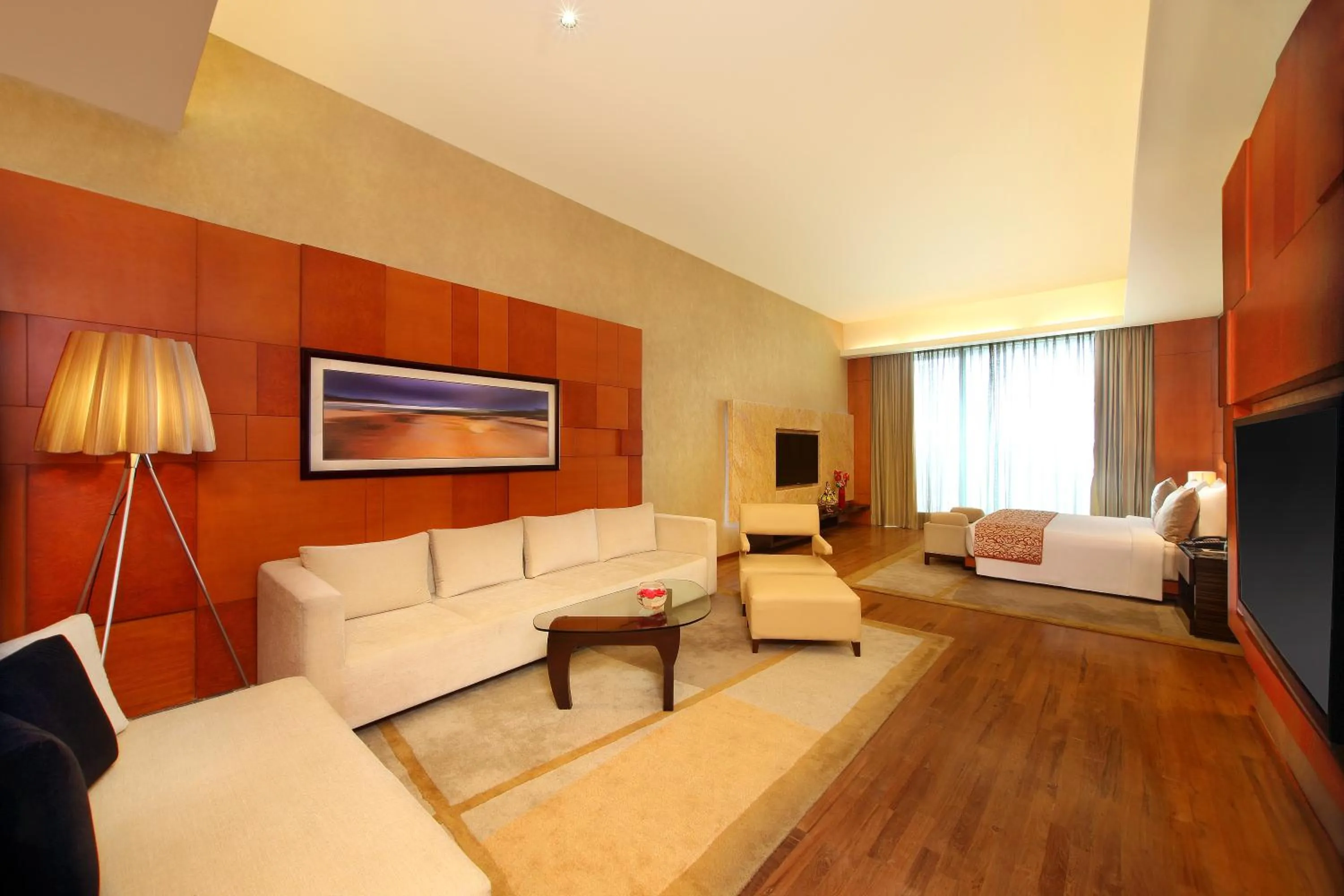 Living room, Bed in Gokulam Grand Hotel & Spa Bangalore