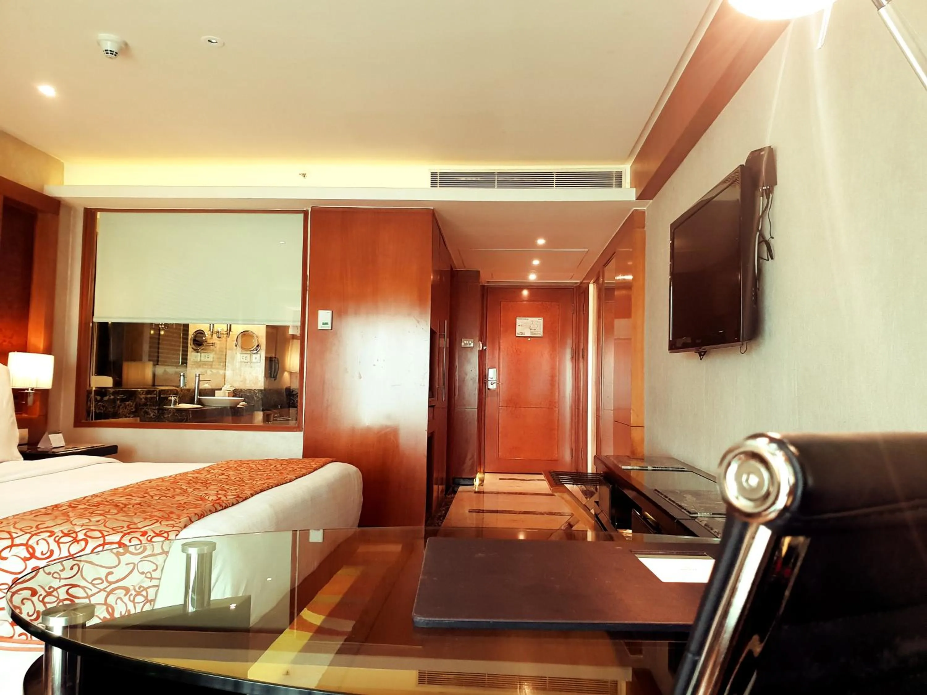 Photo of the whole room, Bed in Gokulam Grand Hotel & Spa Bangalore