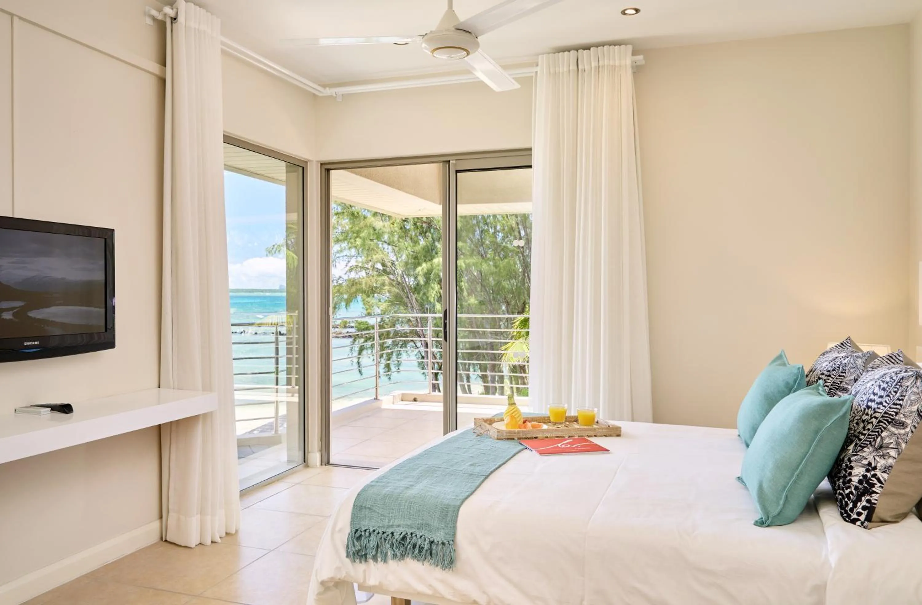 Bed in Bon Azur Beachfront Suites & Penthouses by LOV Mauritius
