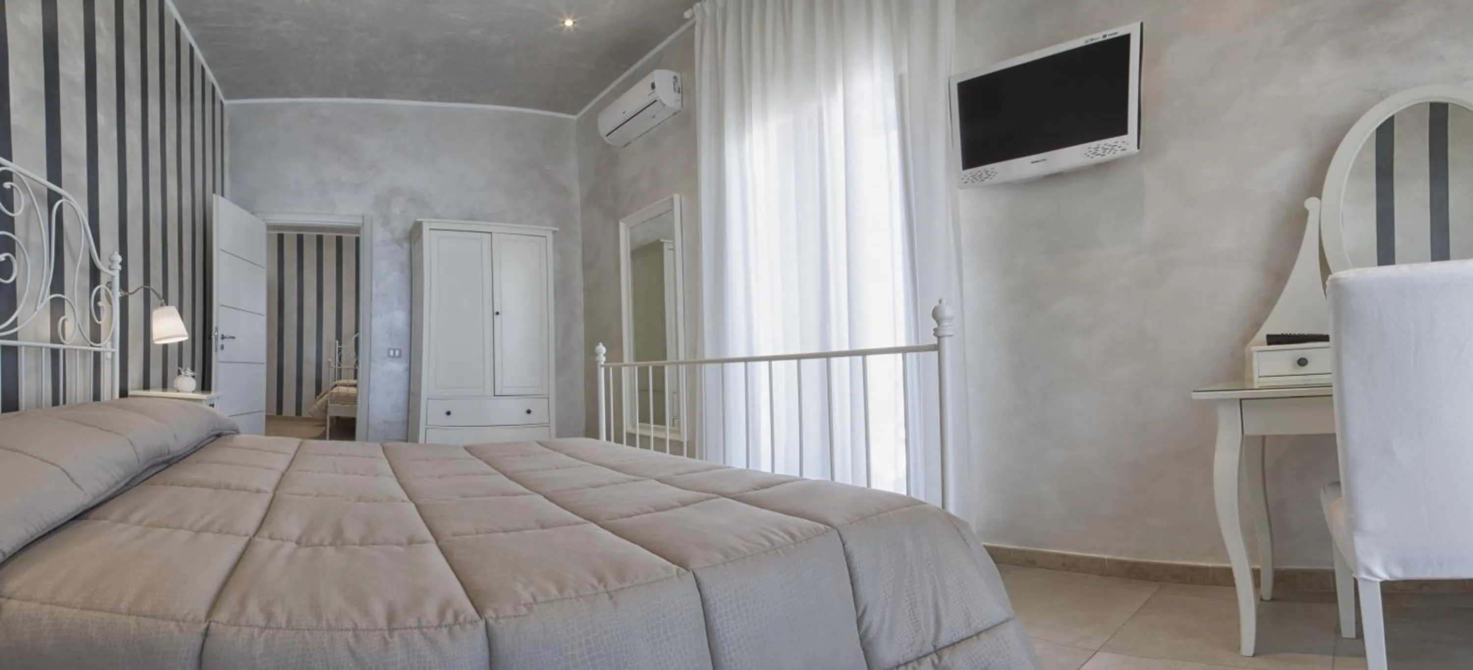 TV and multimedia, Bed in Relais La Pretura