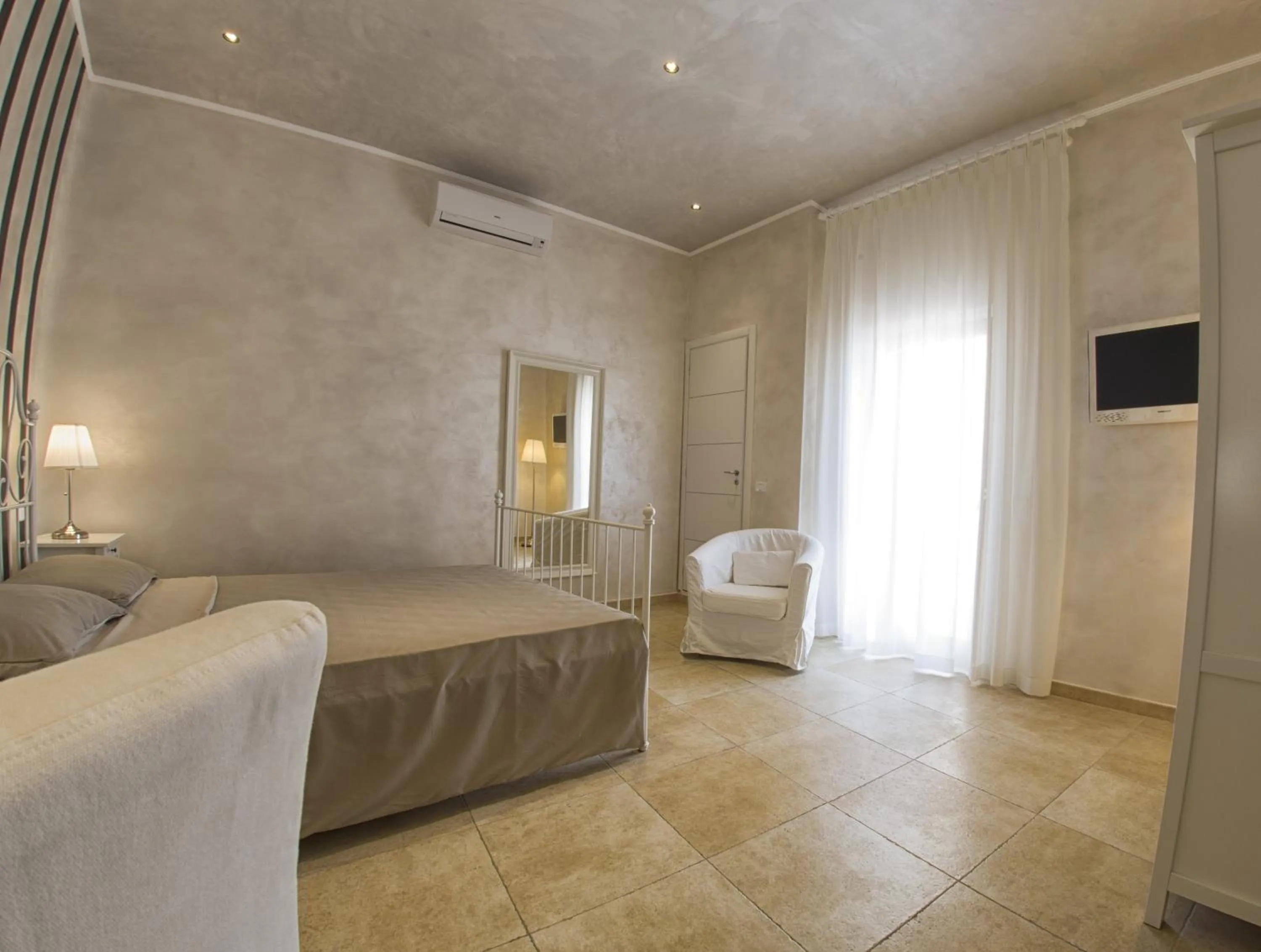 Bed in Relais La Pretura