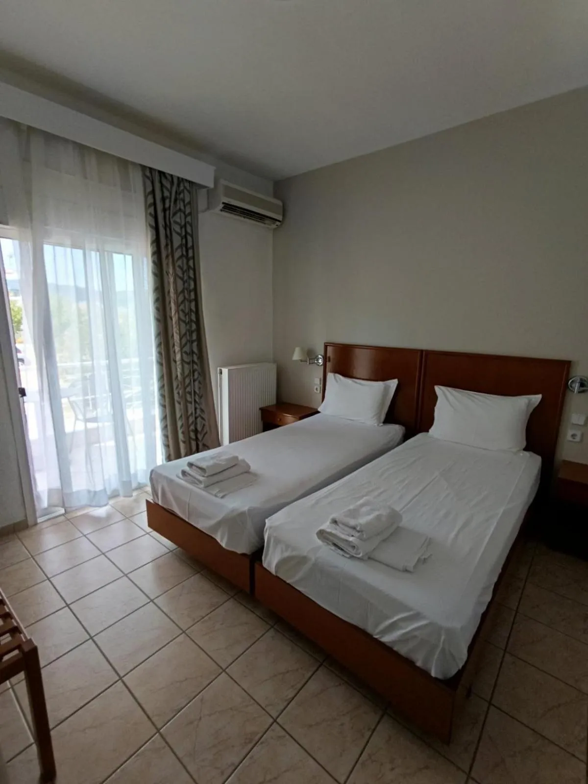 TV and multimedia, Bed in Stavros Beach Hotel