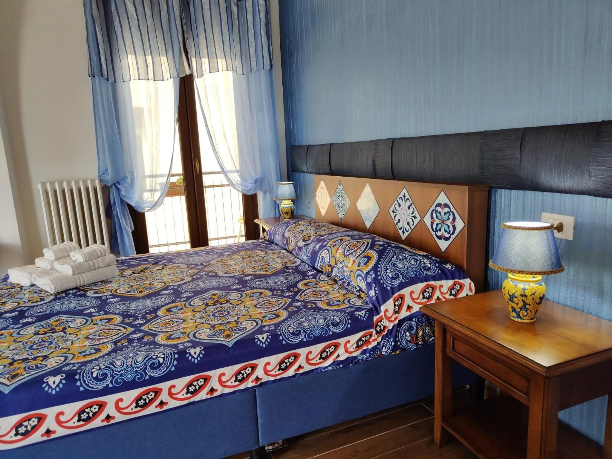 Bed in Centro Sicilia Rooms & Suites