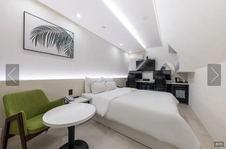 Bed in Jamsil Tomgi Hotel