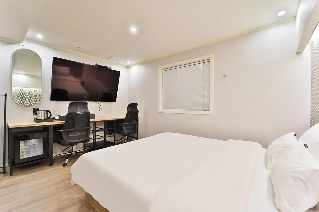 Bed in Jamsil Tomgi Hotel