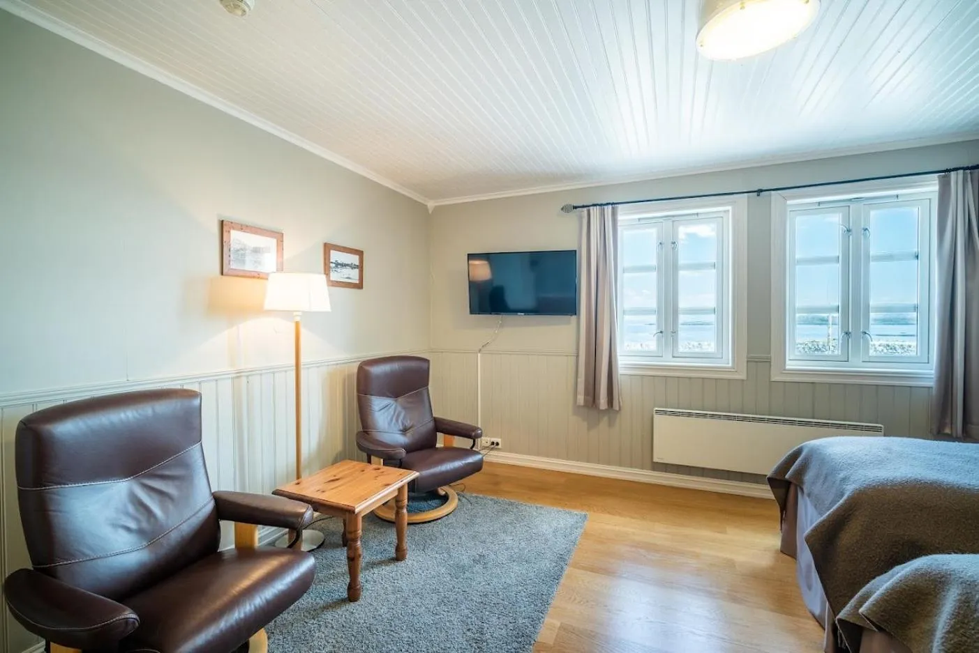 Seating area in Finnøy Bryggehotell - by Classic Norway Hotels