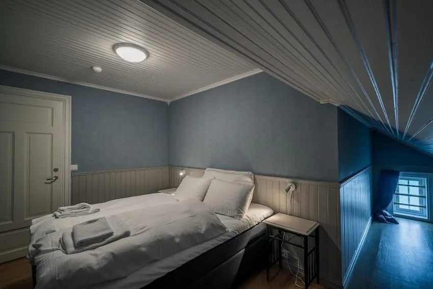 Bedroom, Bed in Ona Havstuer - by Classic Norway Hotels
