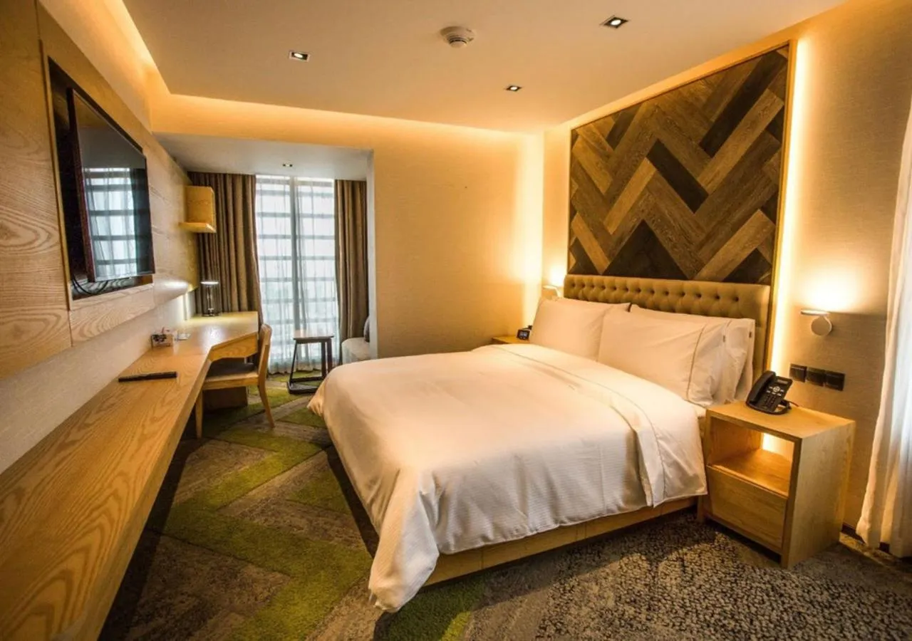 Seating area, Bed in HANSA- A Premium Residence