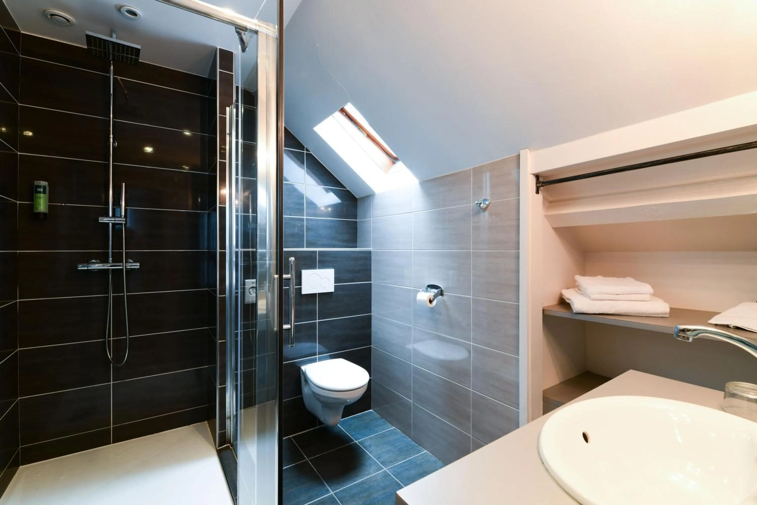 Bathroom in Logis Hôtel Etchemaïté