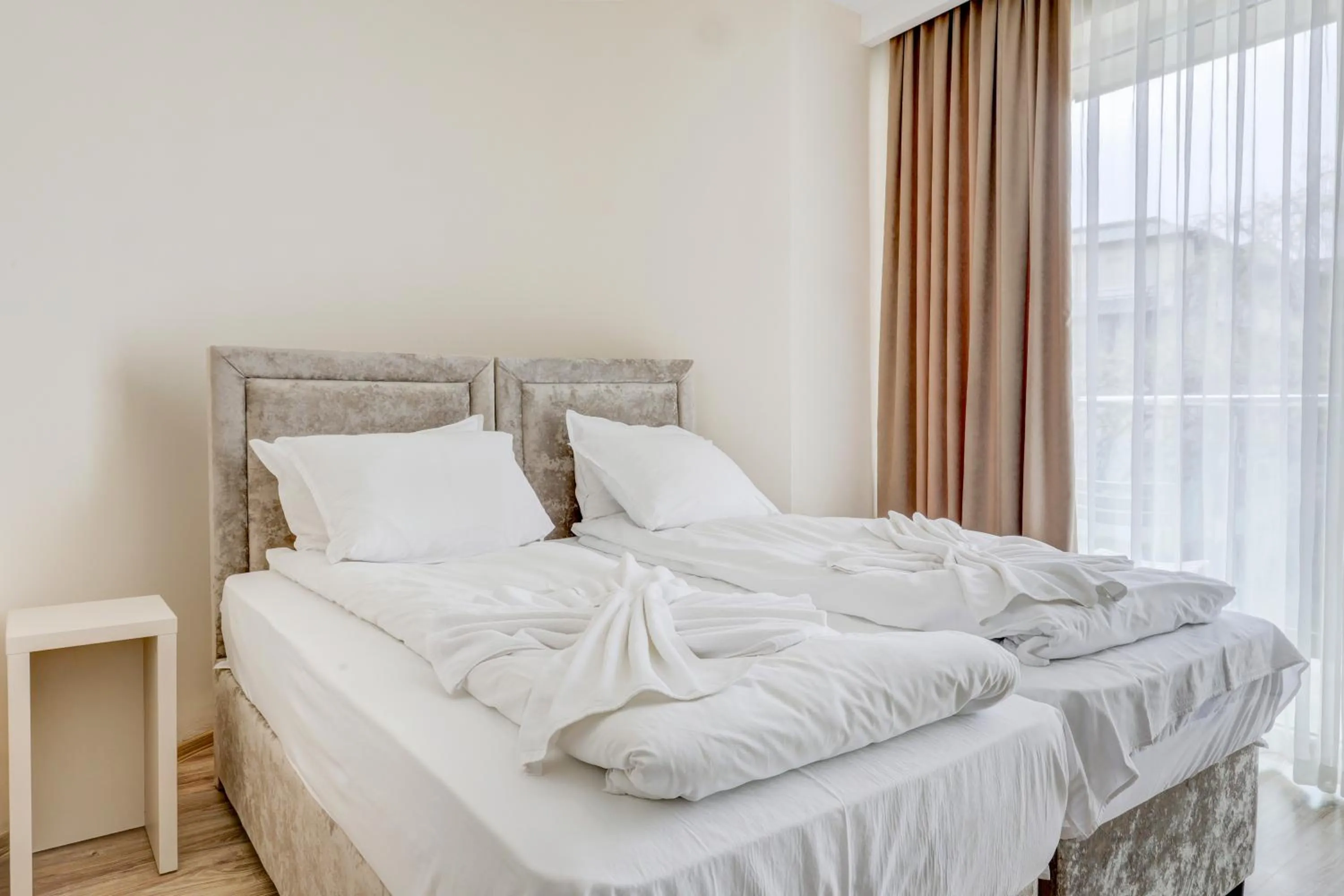 Bed in Jupiter 1 Family Hotel