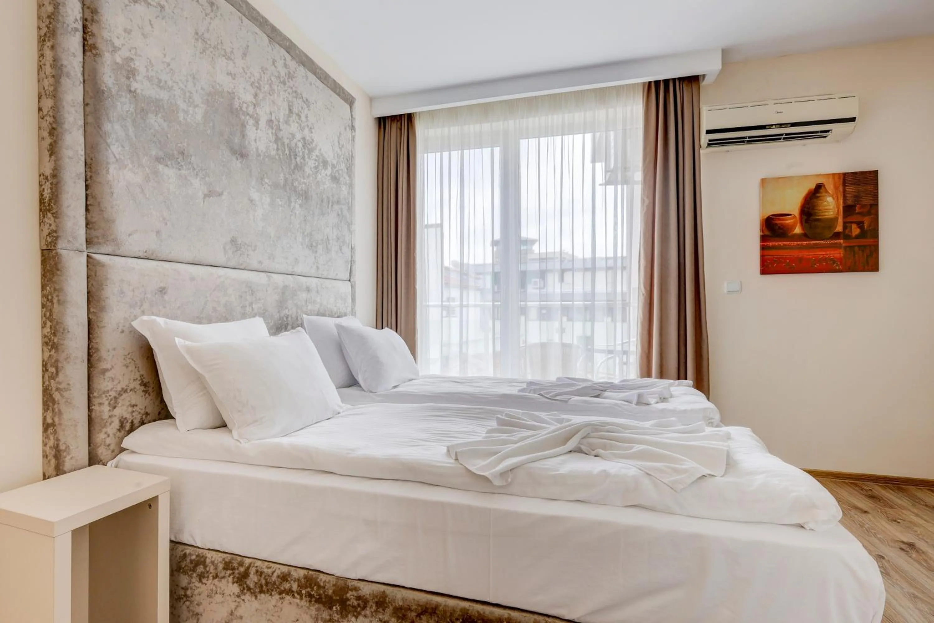 Bed in Jupiter 1 Family Hotel