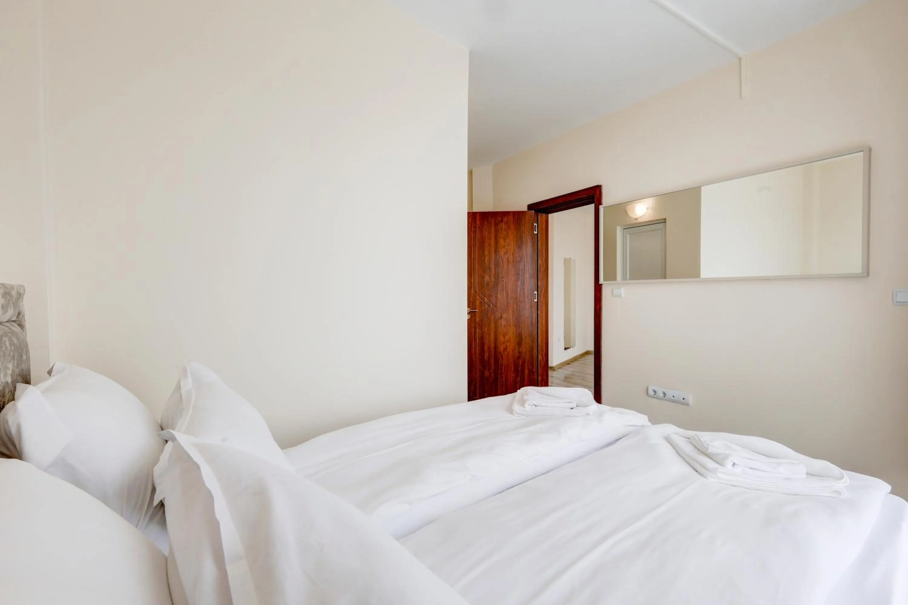 Bed in Jupiter 1 Family Hotel