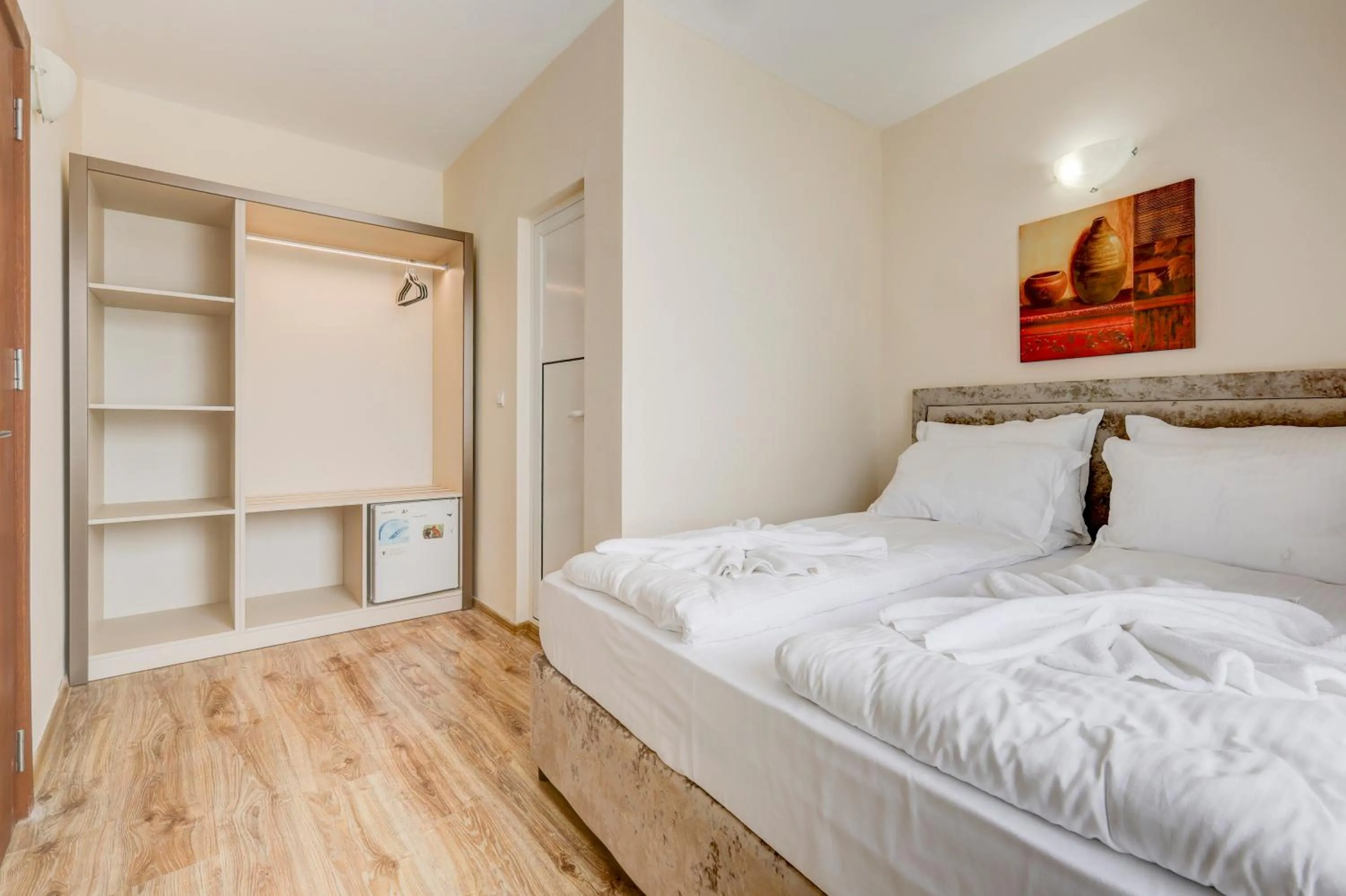 Bed in Jupiter 1 Family Hotel