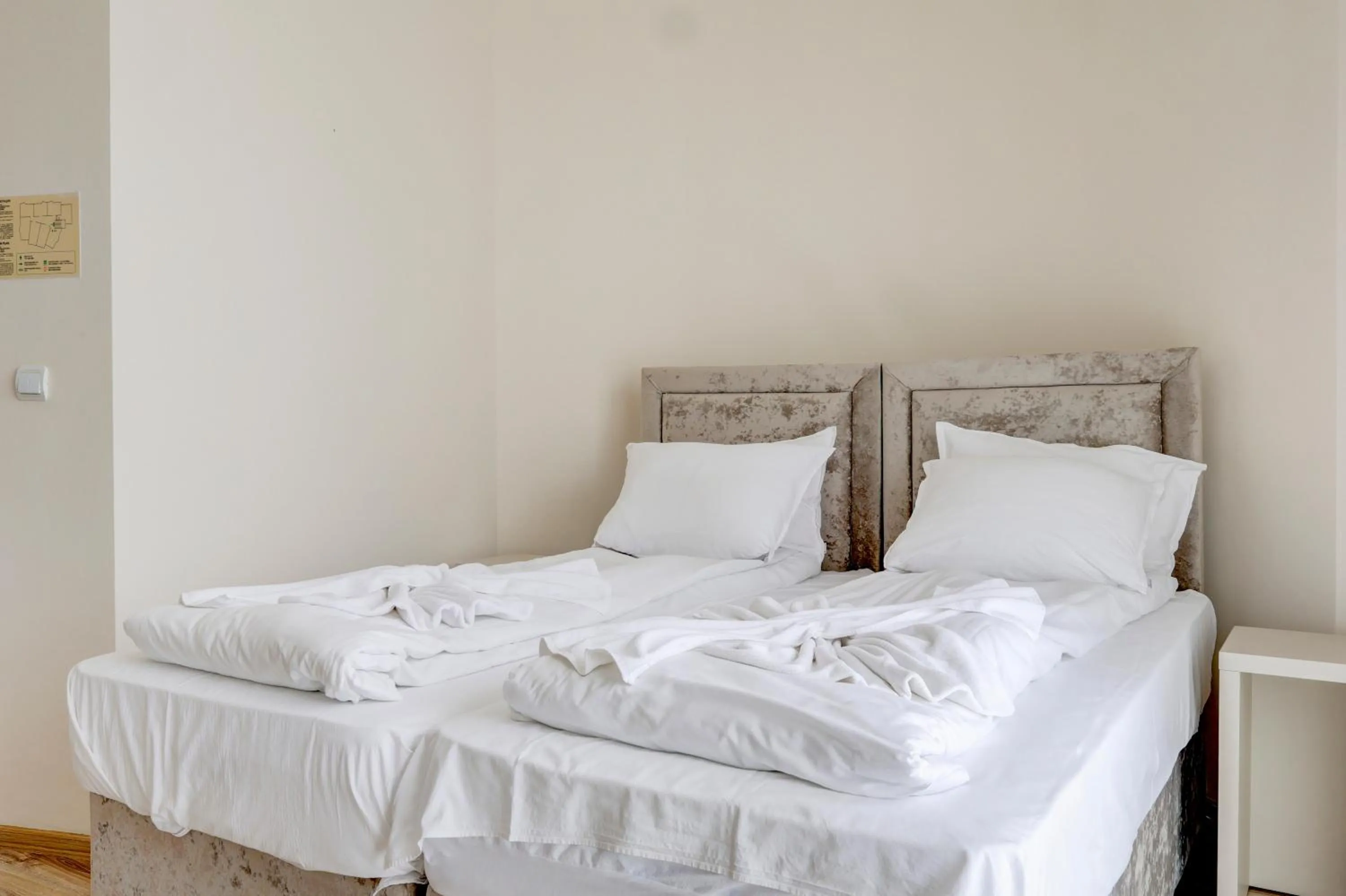 Bed in Jupiter 1 Family Hotel