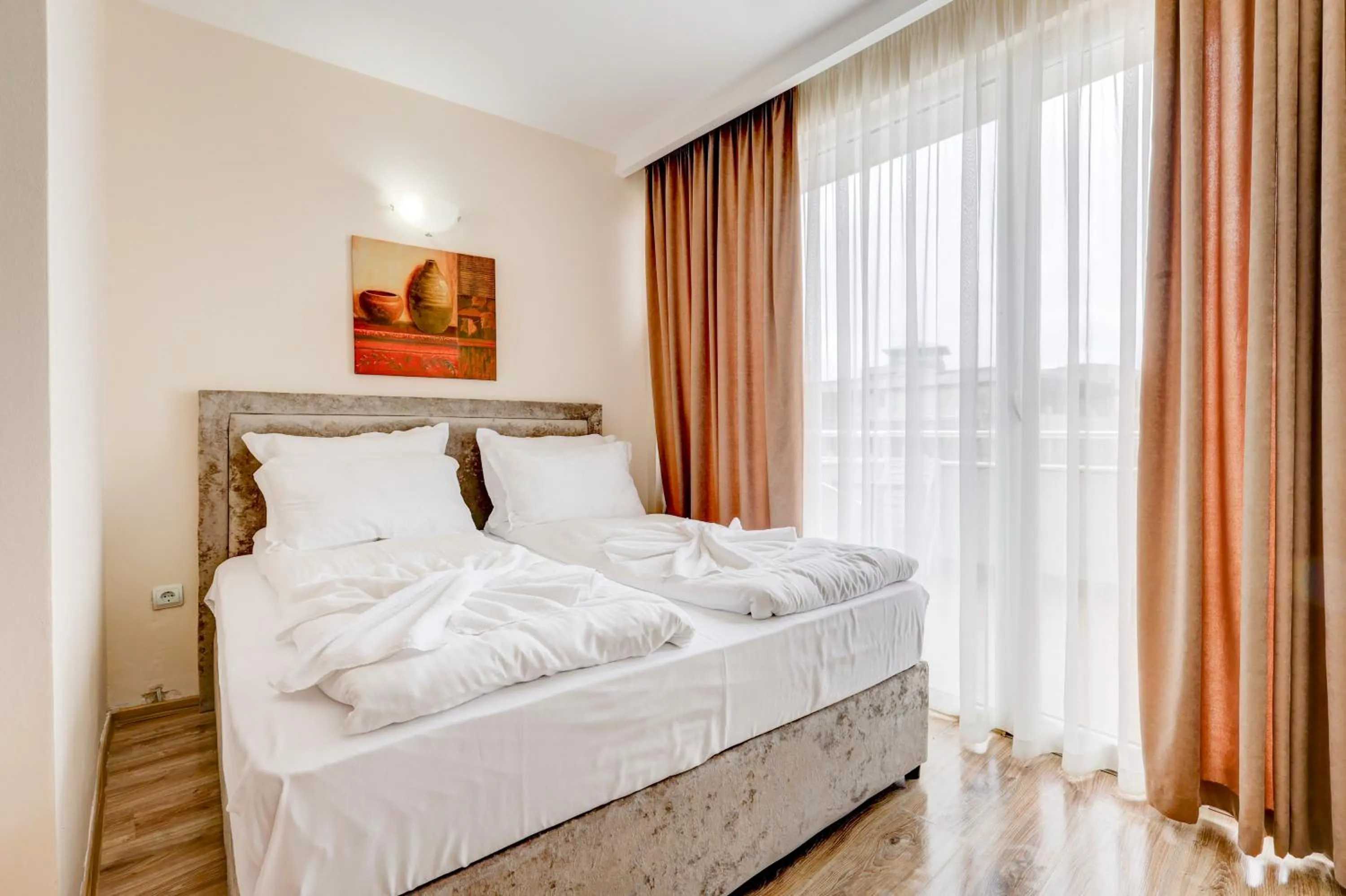 Bed in Jupiter 1 Family Hotel