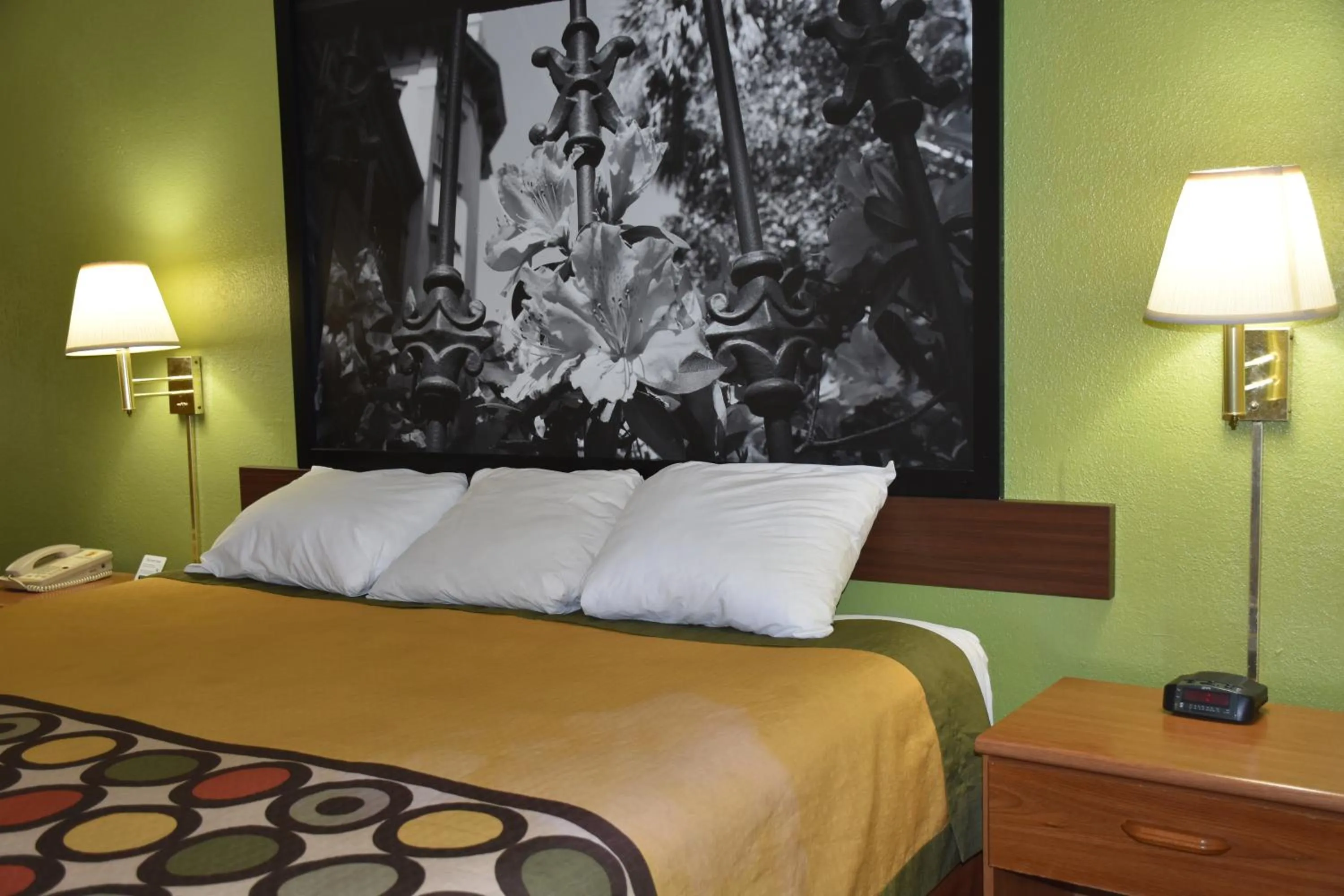 Bed in Super 8 by Wyndham Tifton