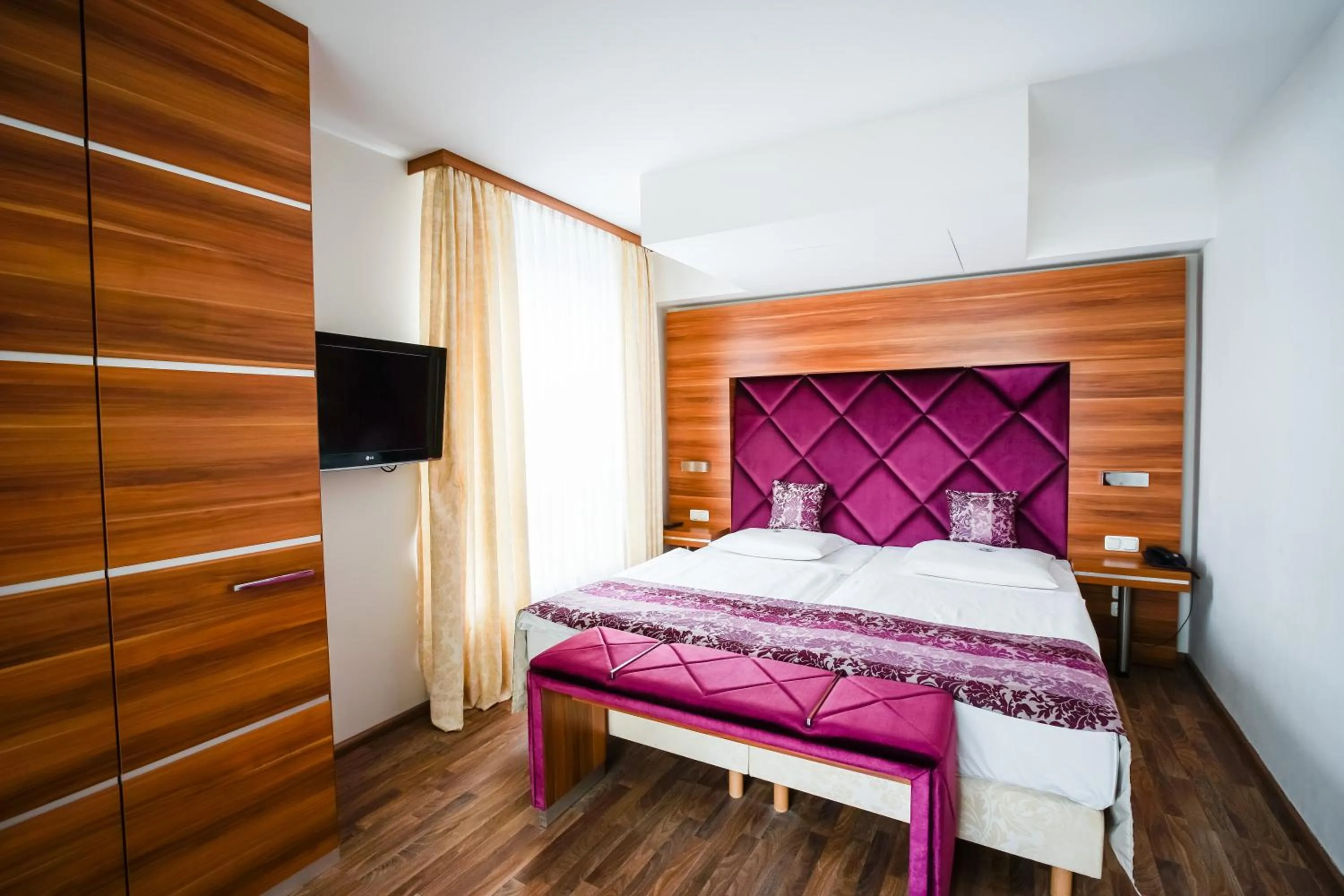 Photo of the whole room, Bed in Arkona Strandresidenzen