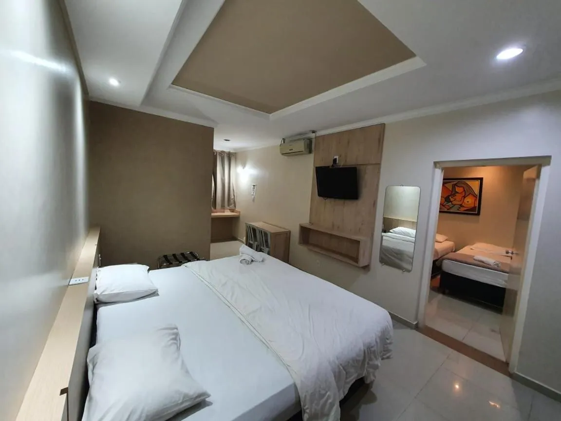 Photo of the whole room, Bed in Biss Inn Hotel