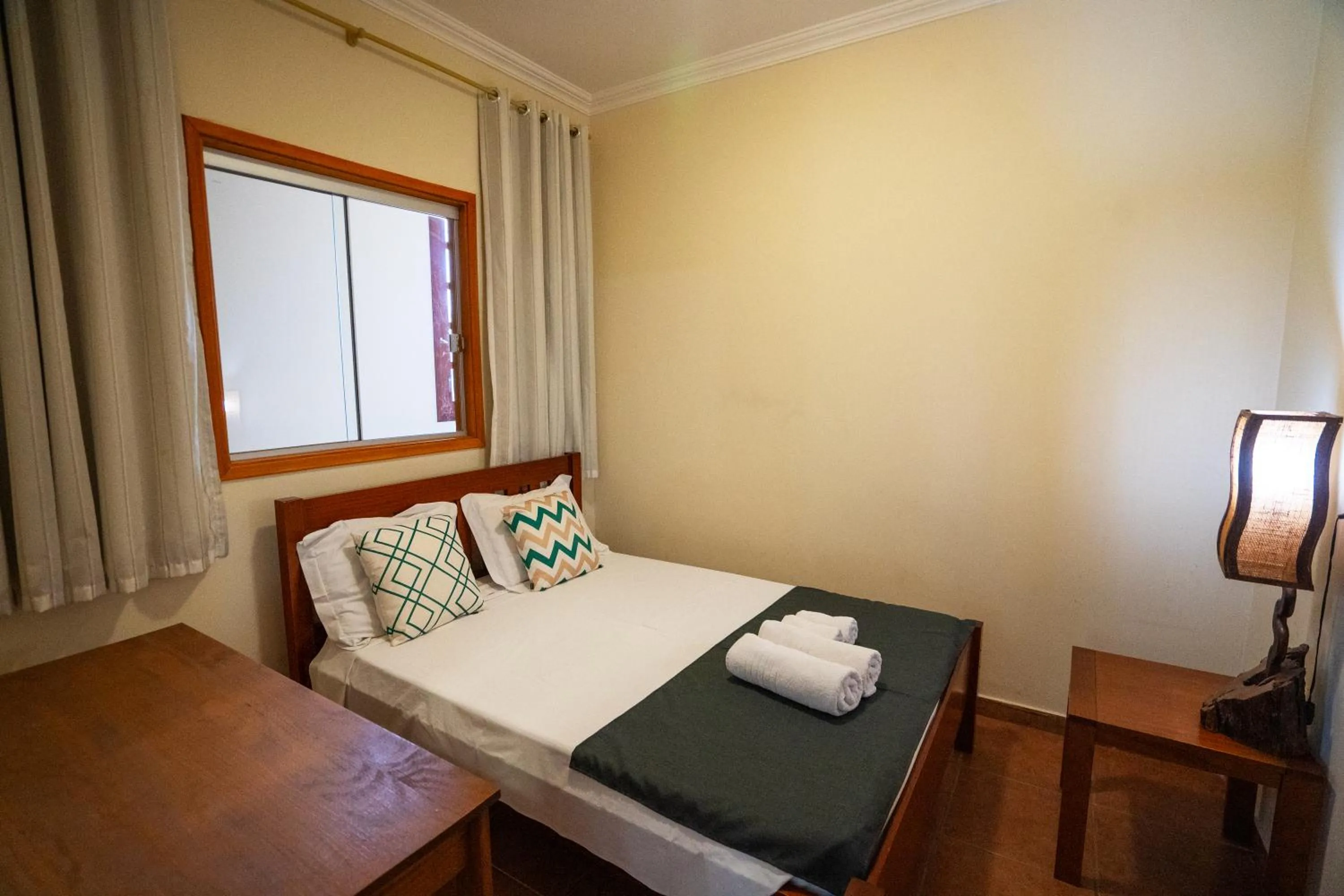 Bed in Pousada Galeria Artes