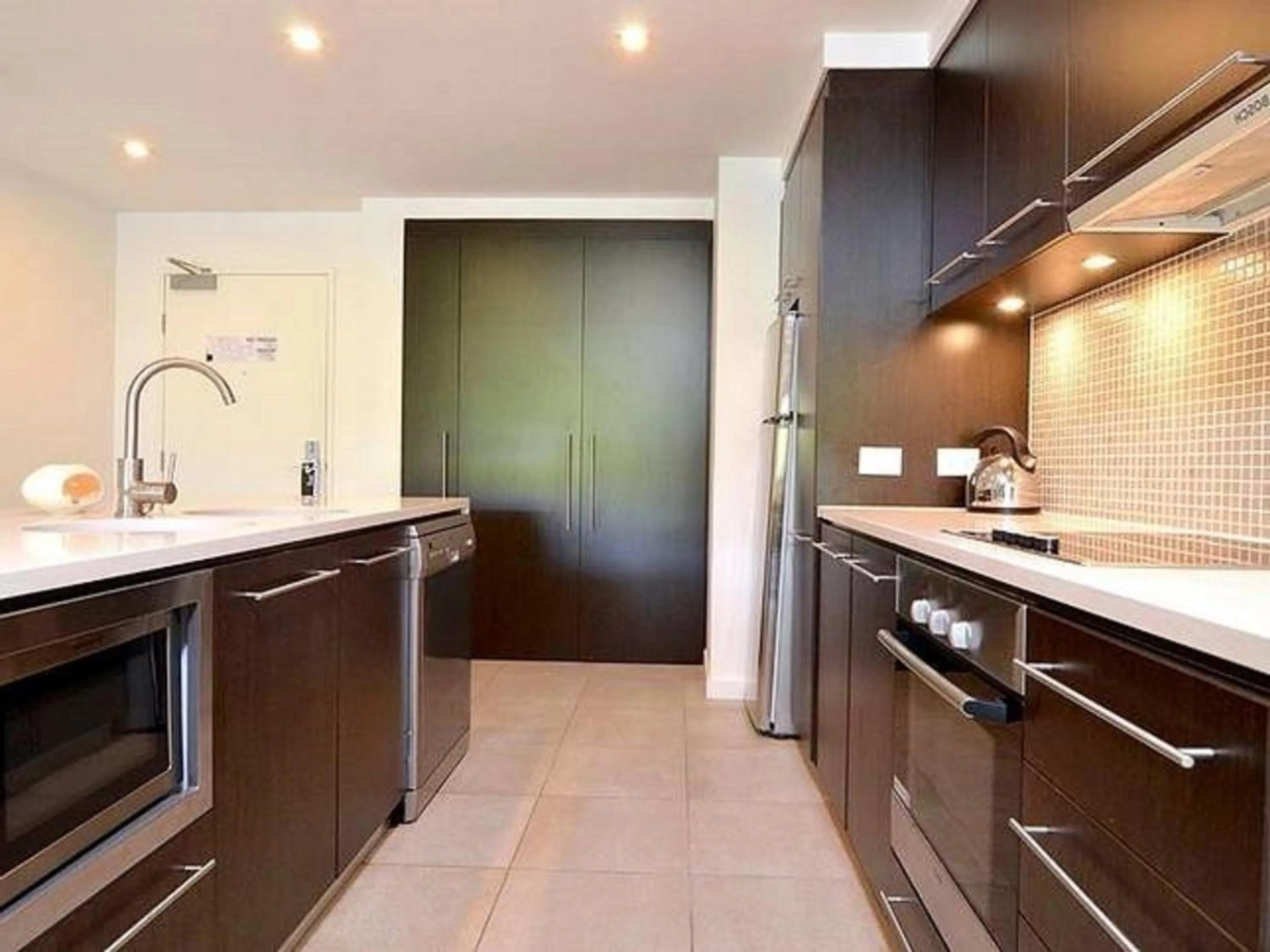 kitchen in Luxury Apartments at Temple Resort and Spa Port Douglas