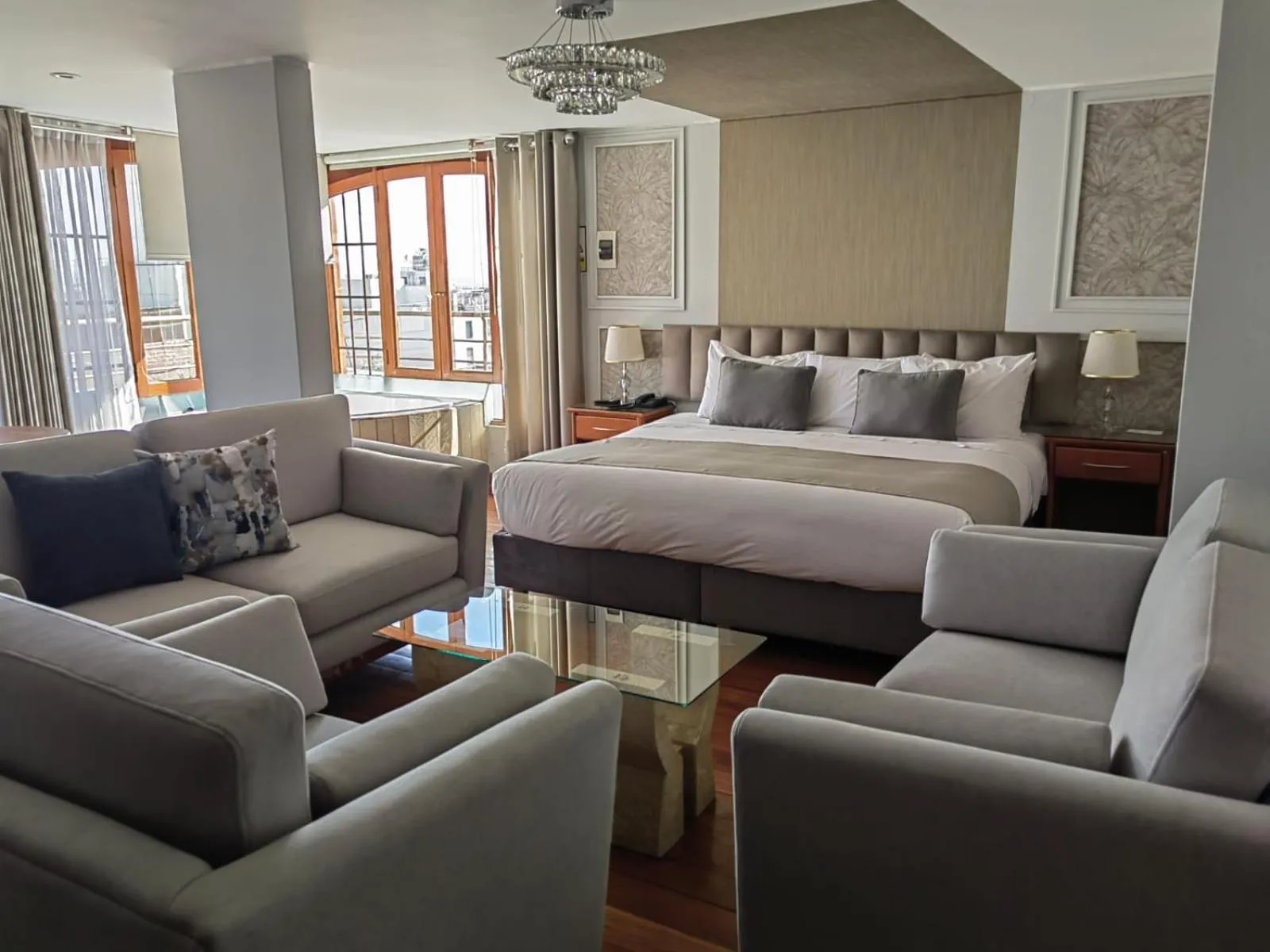 Living room, Bed in Hotel Fundador by Robles