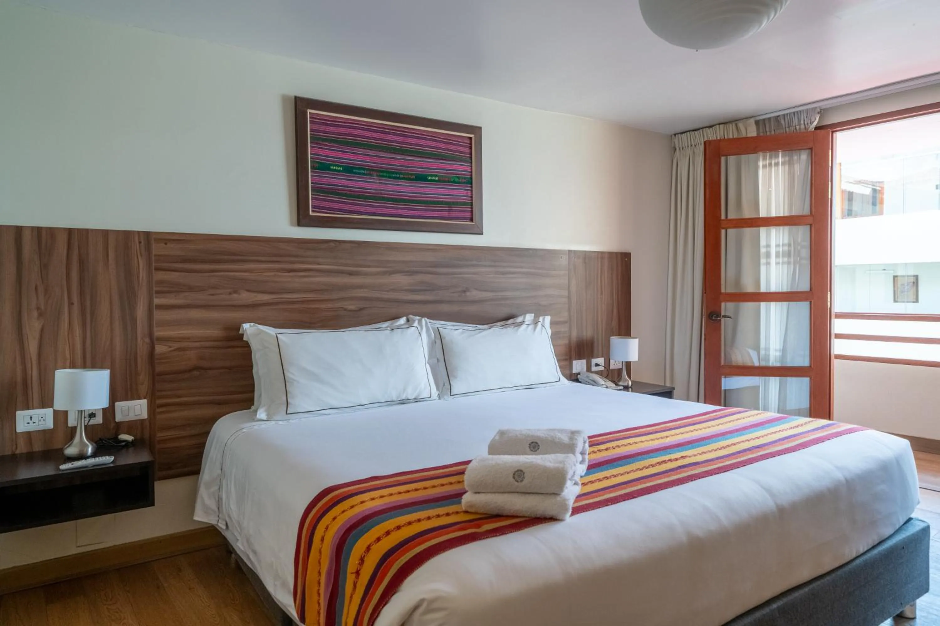 Bed in Taypikala Hotel Cusco