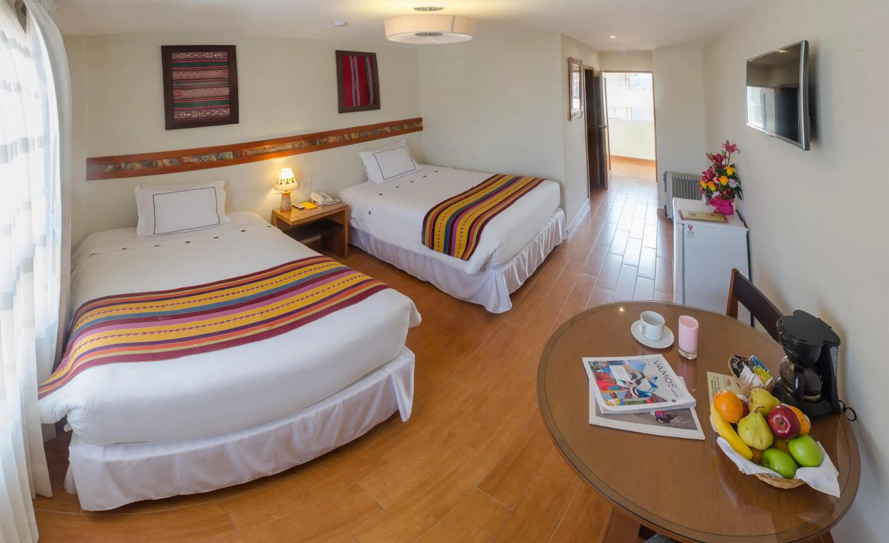 Photo of the whole room, Bed in Taypikala Hotel Cusco