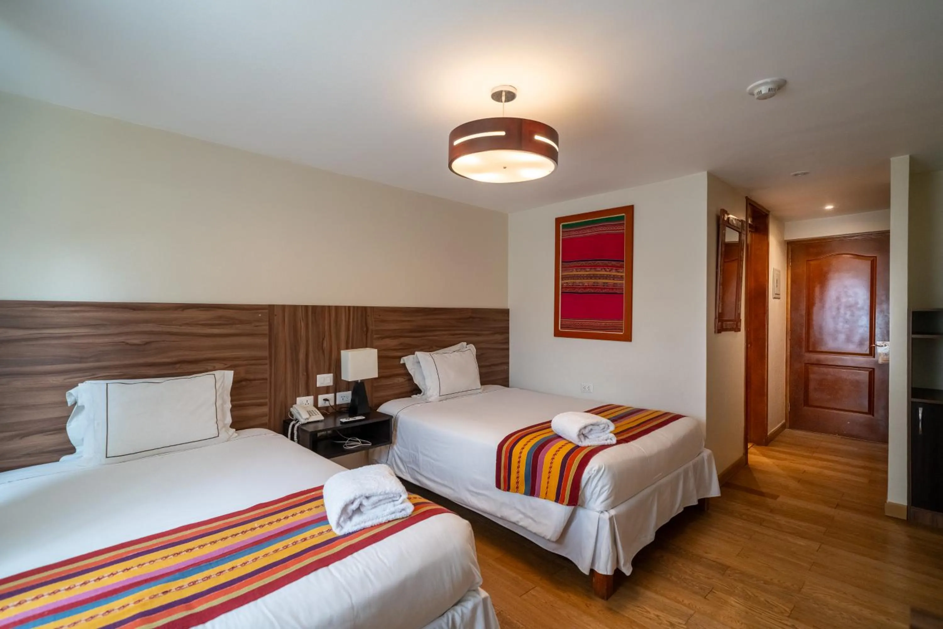 Photo of the whole room, Bed in Taypikala Hotel Cusco