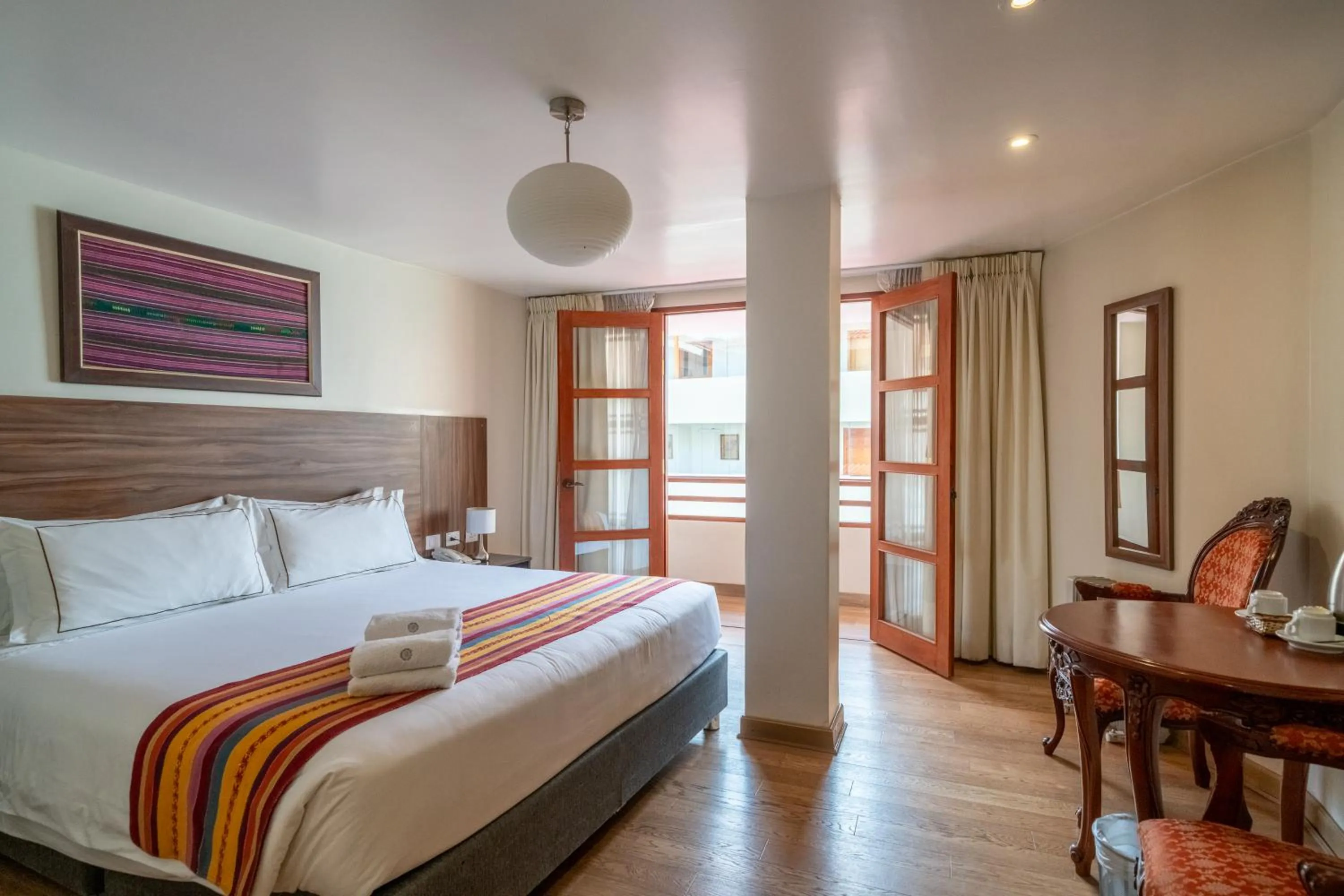 Photo of the whole room, Bed in Taypikala Hotel Cusco