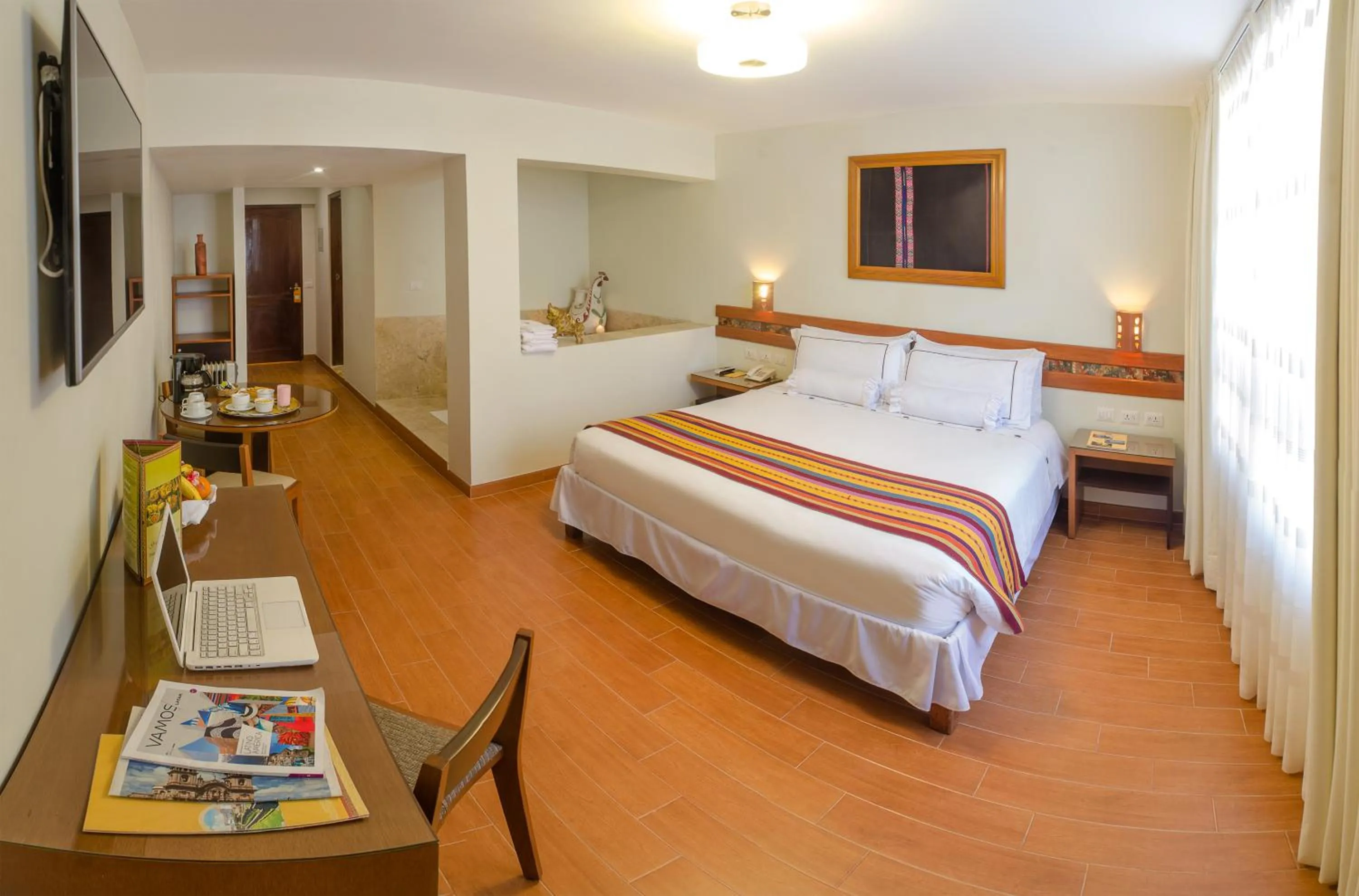 Photo of the whole room, Bed in Taypikala Hotel Cusco