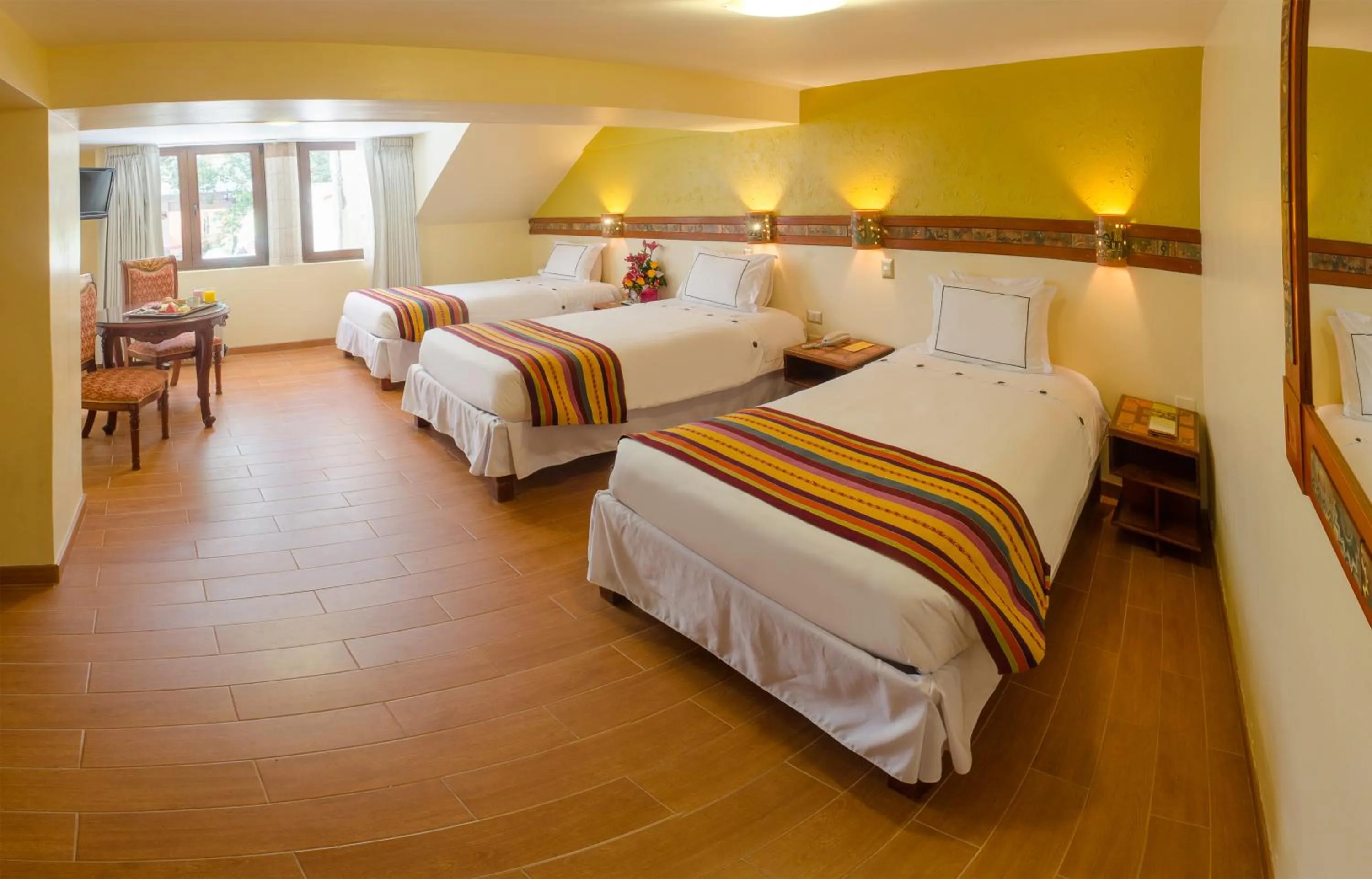Photo of the whole room, Bed in Taypikala Hotel Cusco