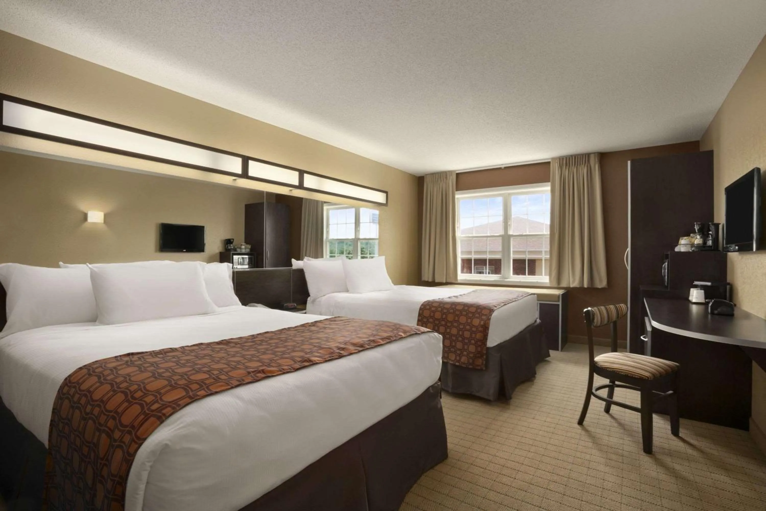 Photo of the whole room, Bed in Microtel Inn & Suites By Wyndham Mineral Wells/Parkersburg