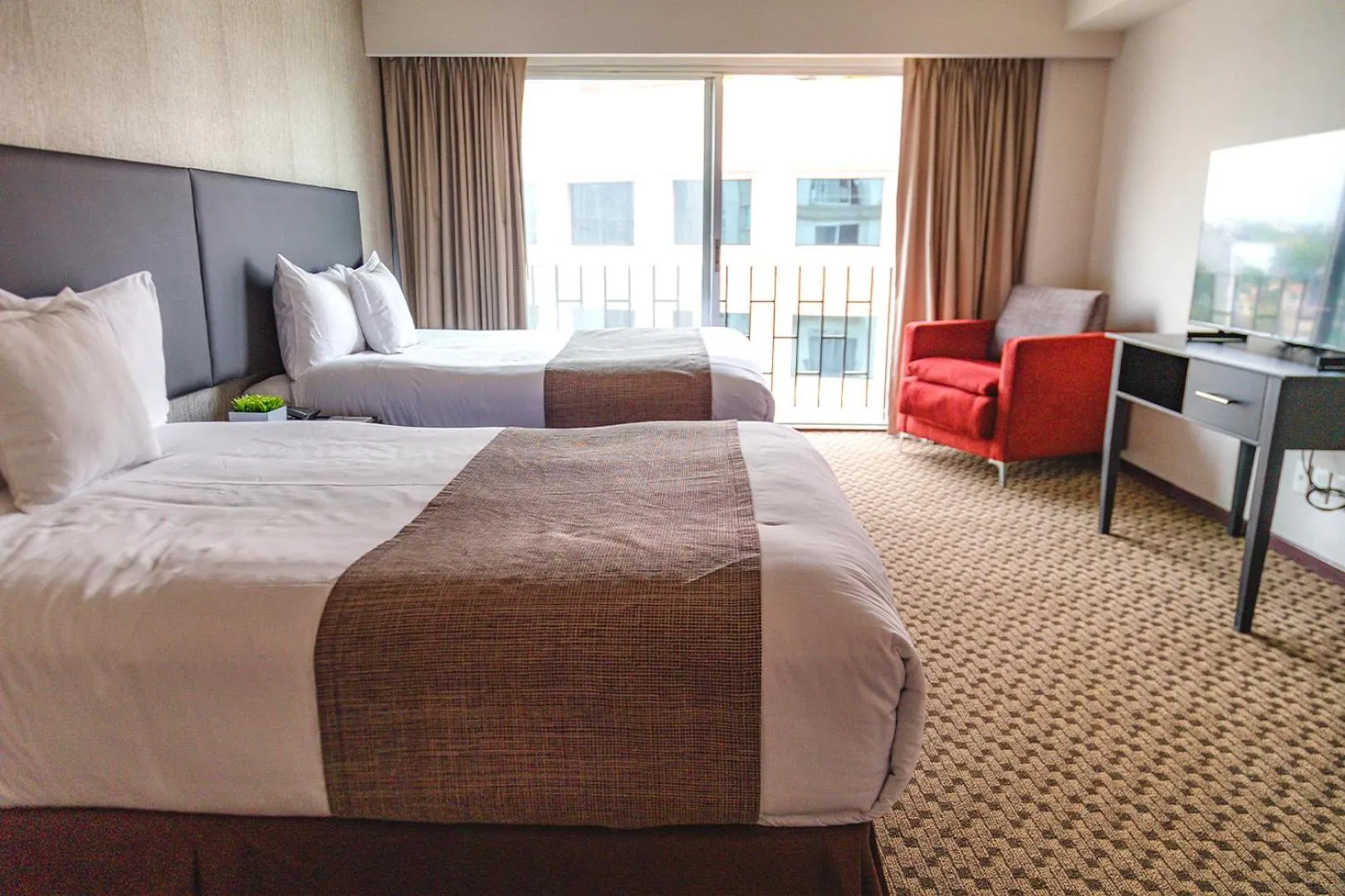 Bed in St Isidro Suites Corporate Housing SPA & Wellness Center