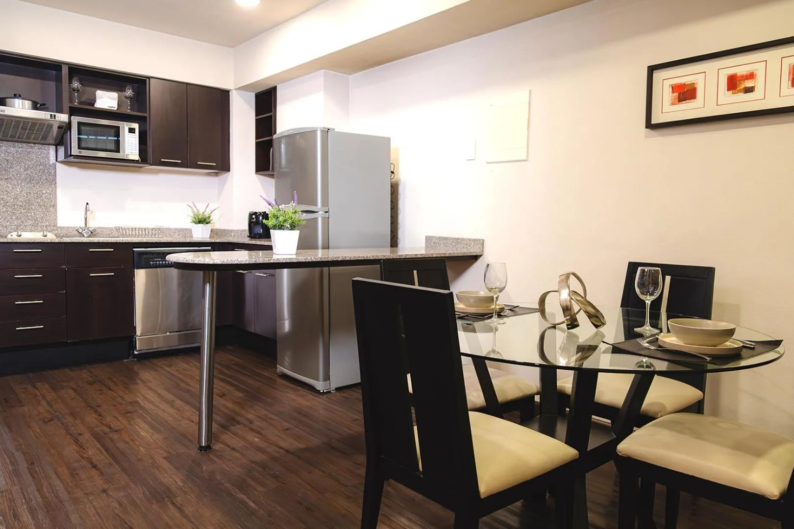 Kitchen or kitchenette in St Isidro Suites Corporate Housing SPA & Wellness Center