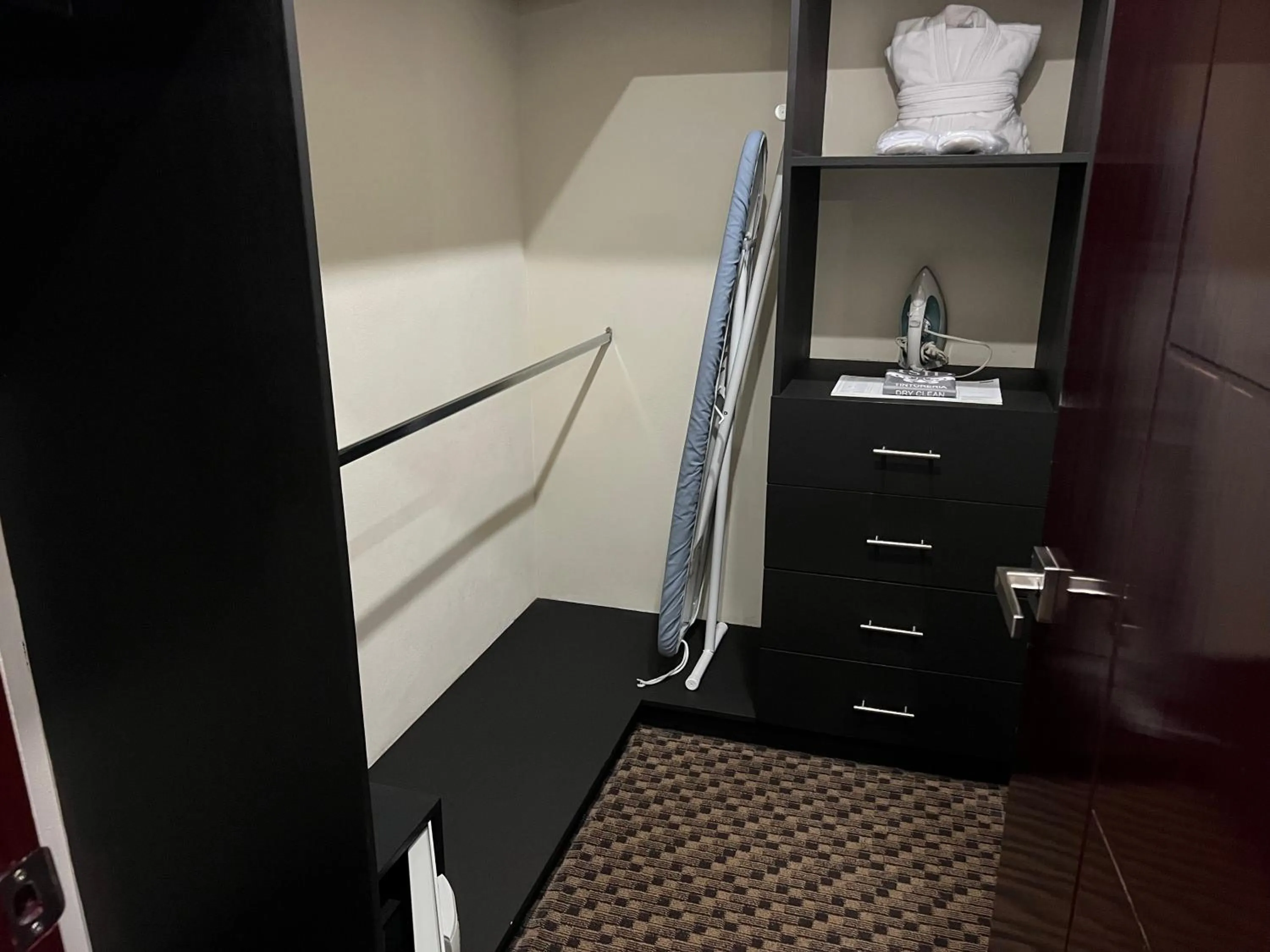 wardrobe in St Isidro Suites Corporate Housing SPA & Wellness Center