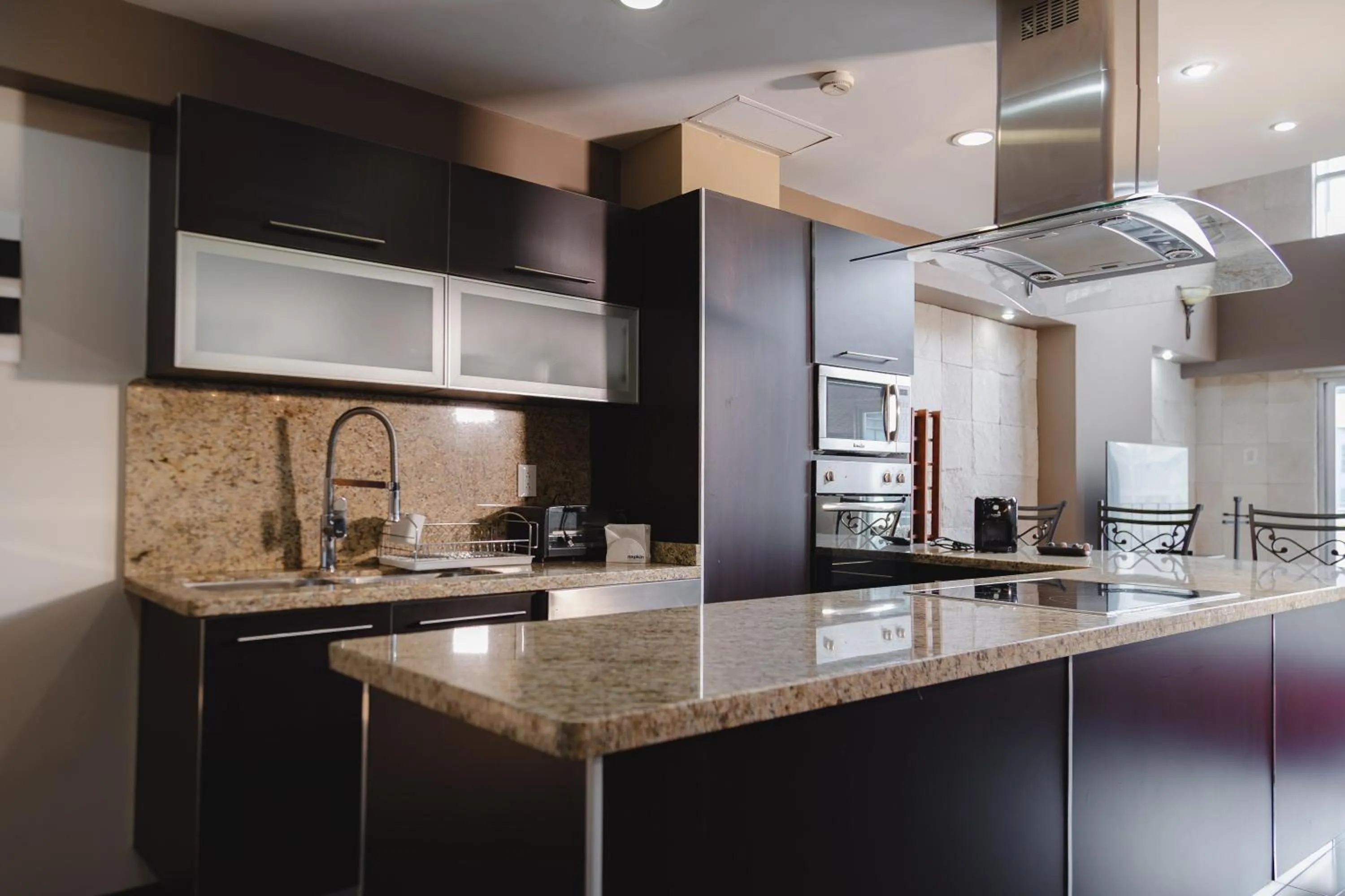kitchen in St Isidro Suites Corporate Housing SPA & Wellness Center