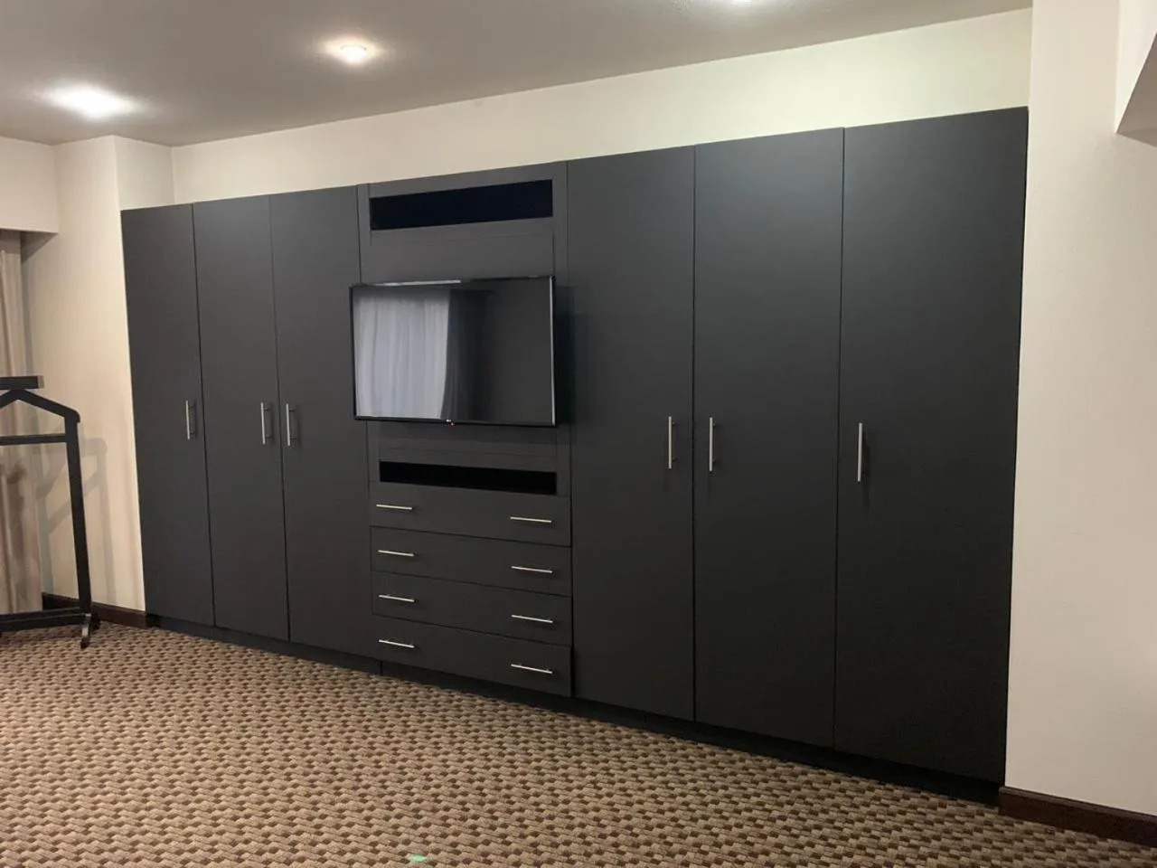 TV and multimedia in St Isidro Suites Corporate Housing SPA & Wellness Center