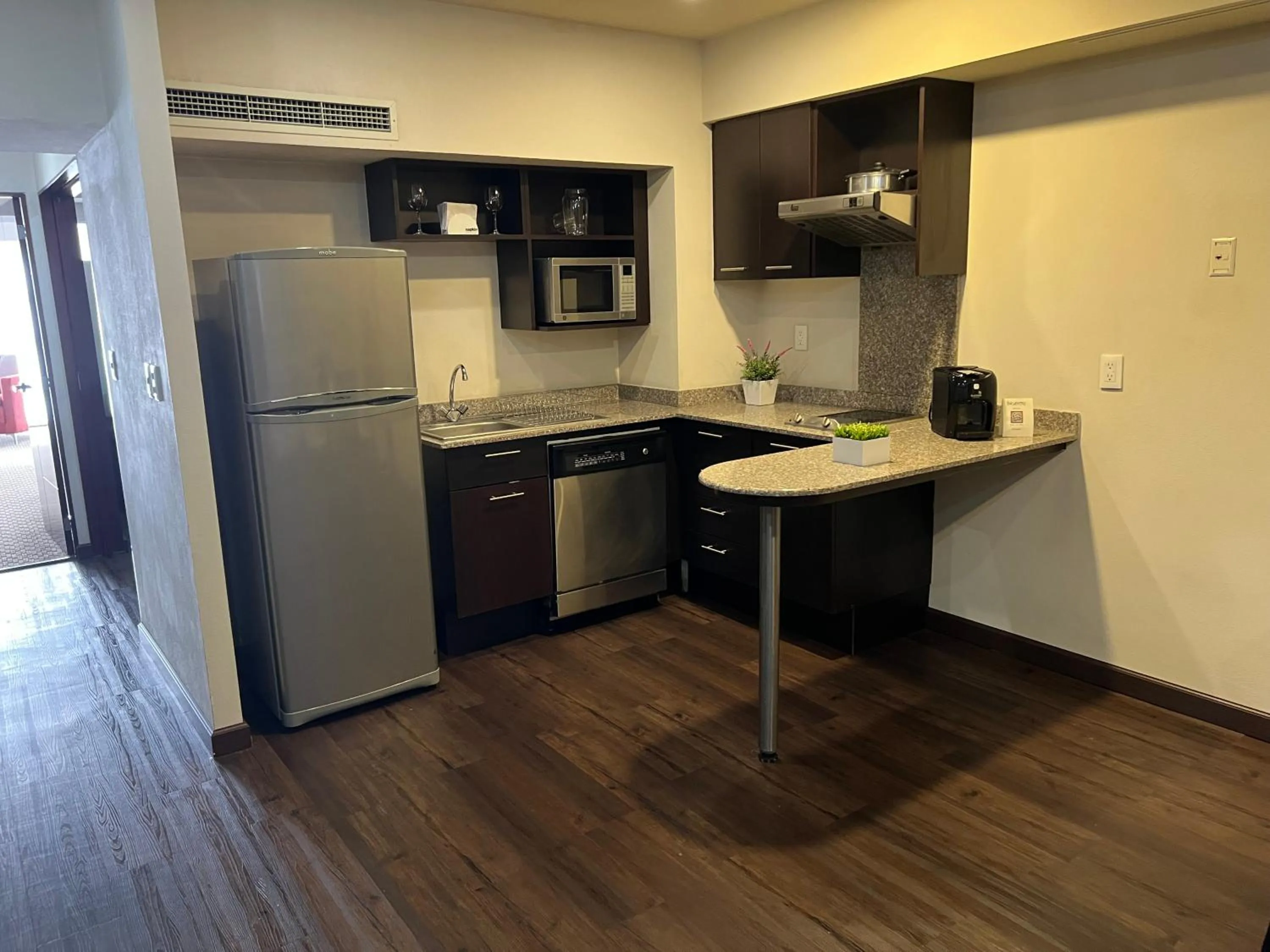 Kitchen or kitchenette in St Isidro Suites Corporate Housing SPA & Wellness Center