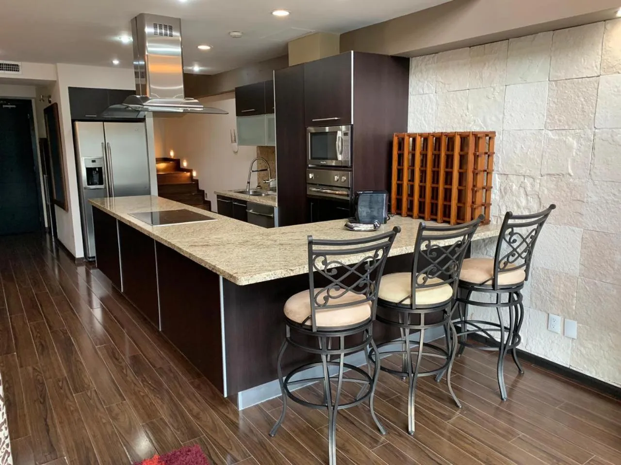 Kitchen or kitchenette in St Isidro Suites Corporate Housing SPA & Wellness Center