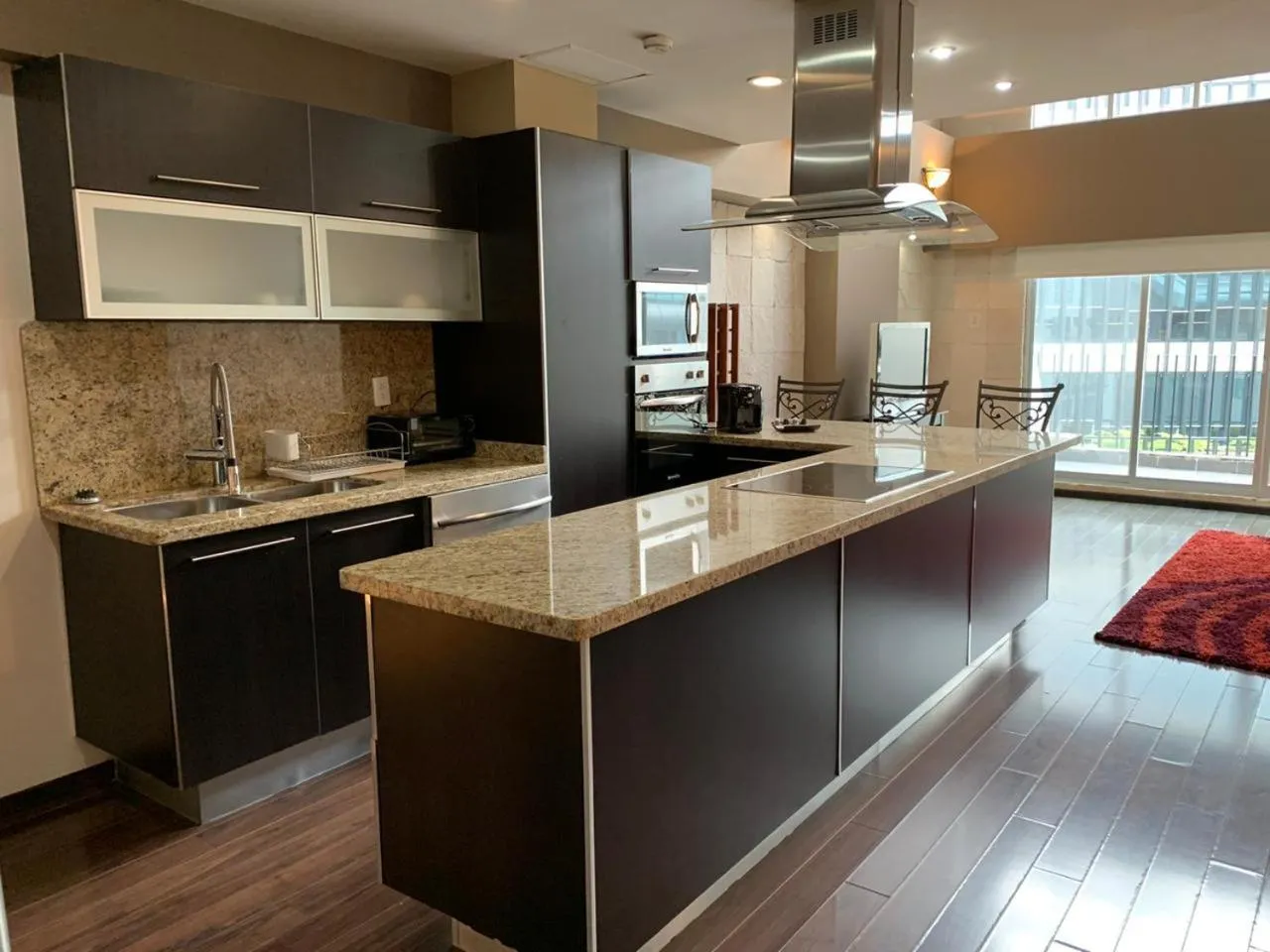 Kitchen or kitchenette in St Isidro Suites Corporate Housing SPA & Wellness Center