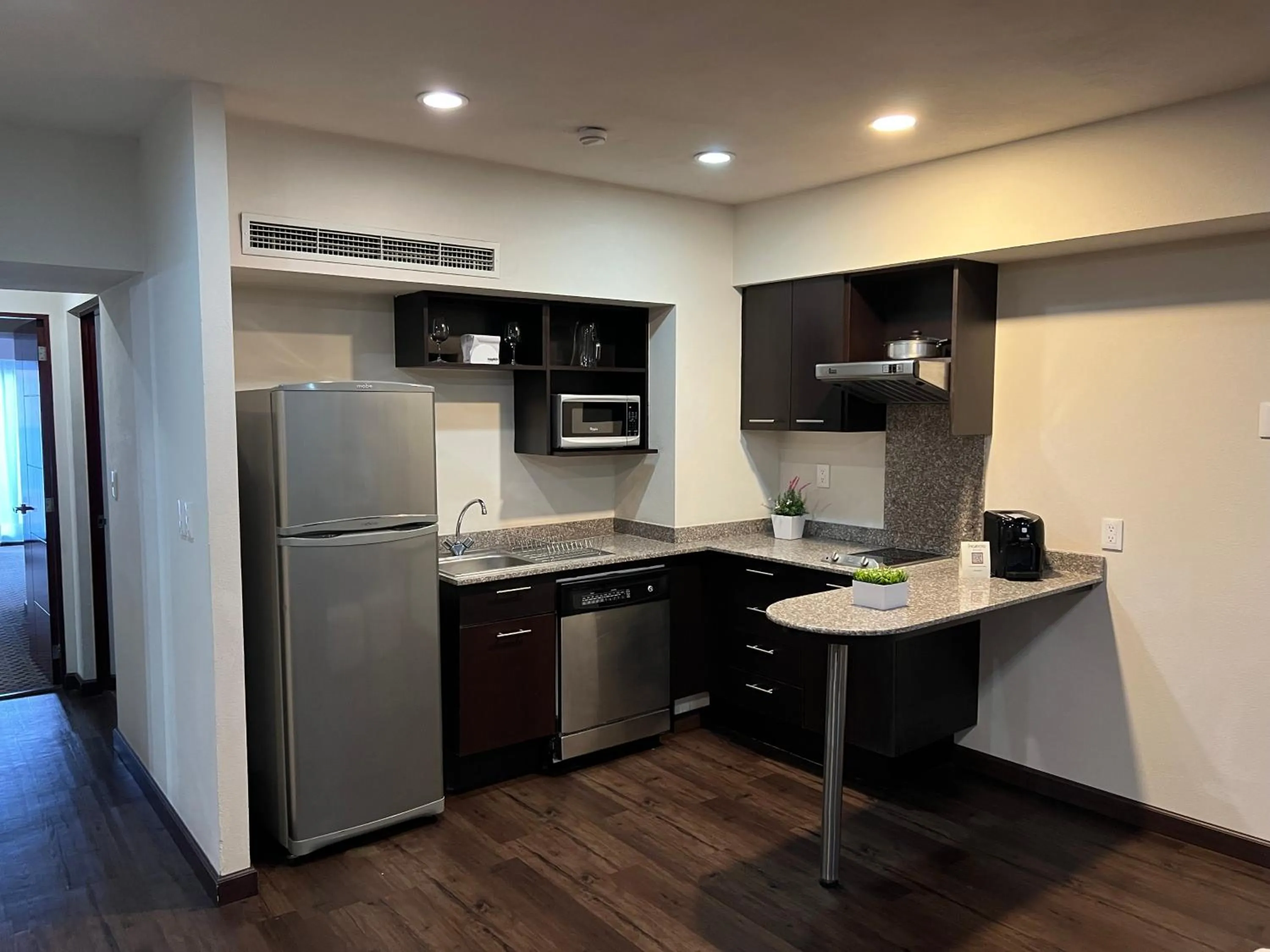 Kitchen or kitchenette in St Isidro Suites Corporate Housing SPA & Wellness Center
